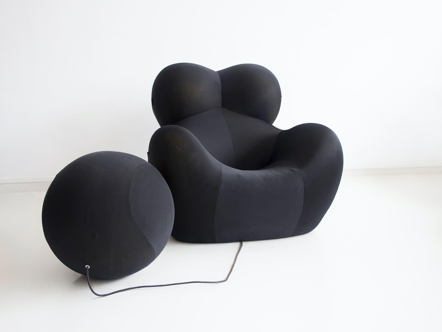 Designed by Gaetano Pesce in 1969 for a few years before being discontinued, the lounge chair and pouf Up 5, also known as big mama, blow up and donna, was reissued in 2000 by B&B Italia. 

The lounge chair Up 5 comes with the Up 6 pouf, which