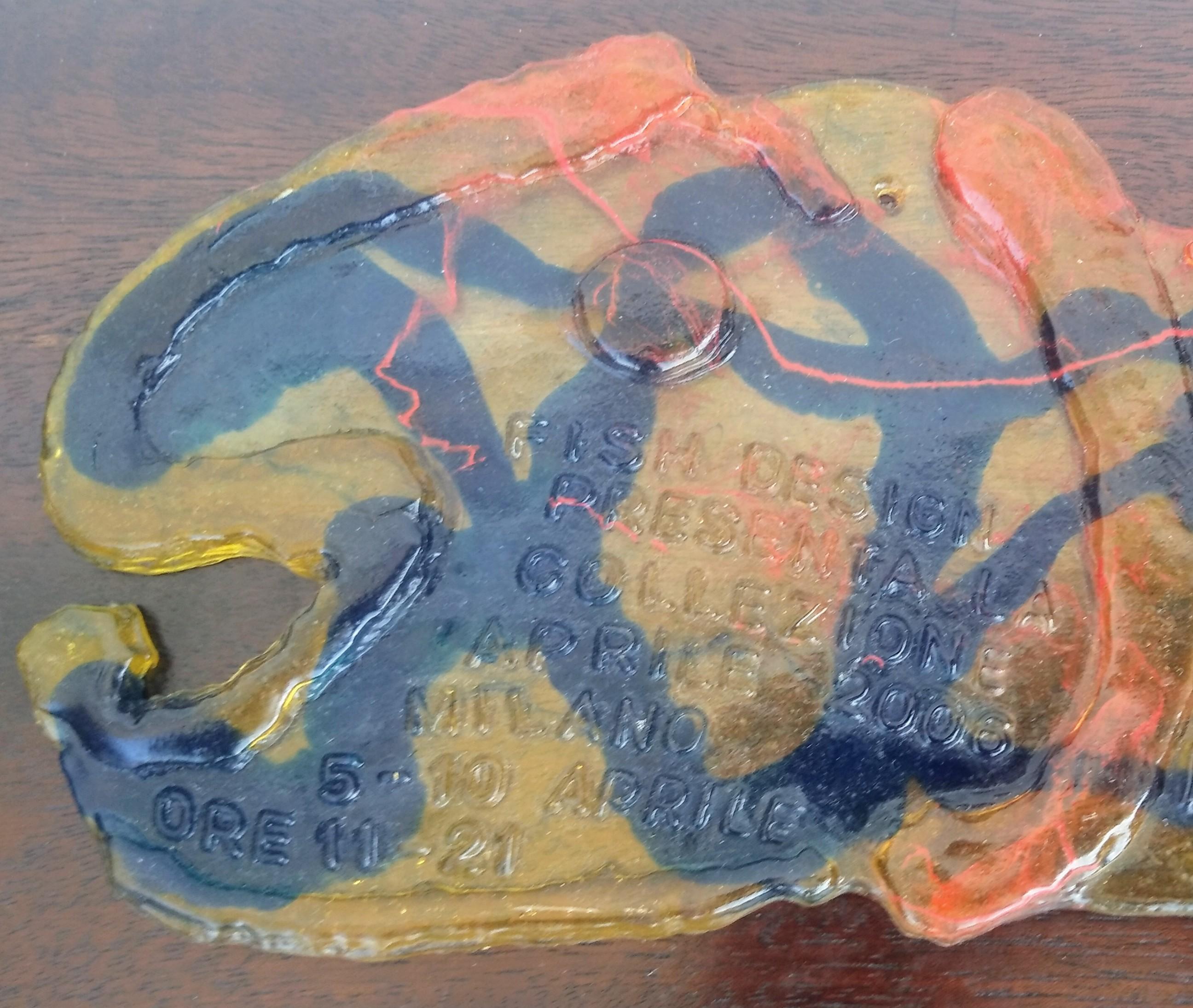This is a Gaetano Pesce Exhibition Invitation. The fish head is cast in rubber/plastic with the details of the exhibition on the invitation.