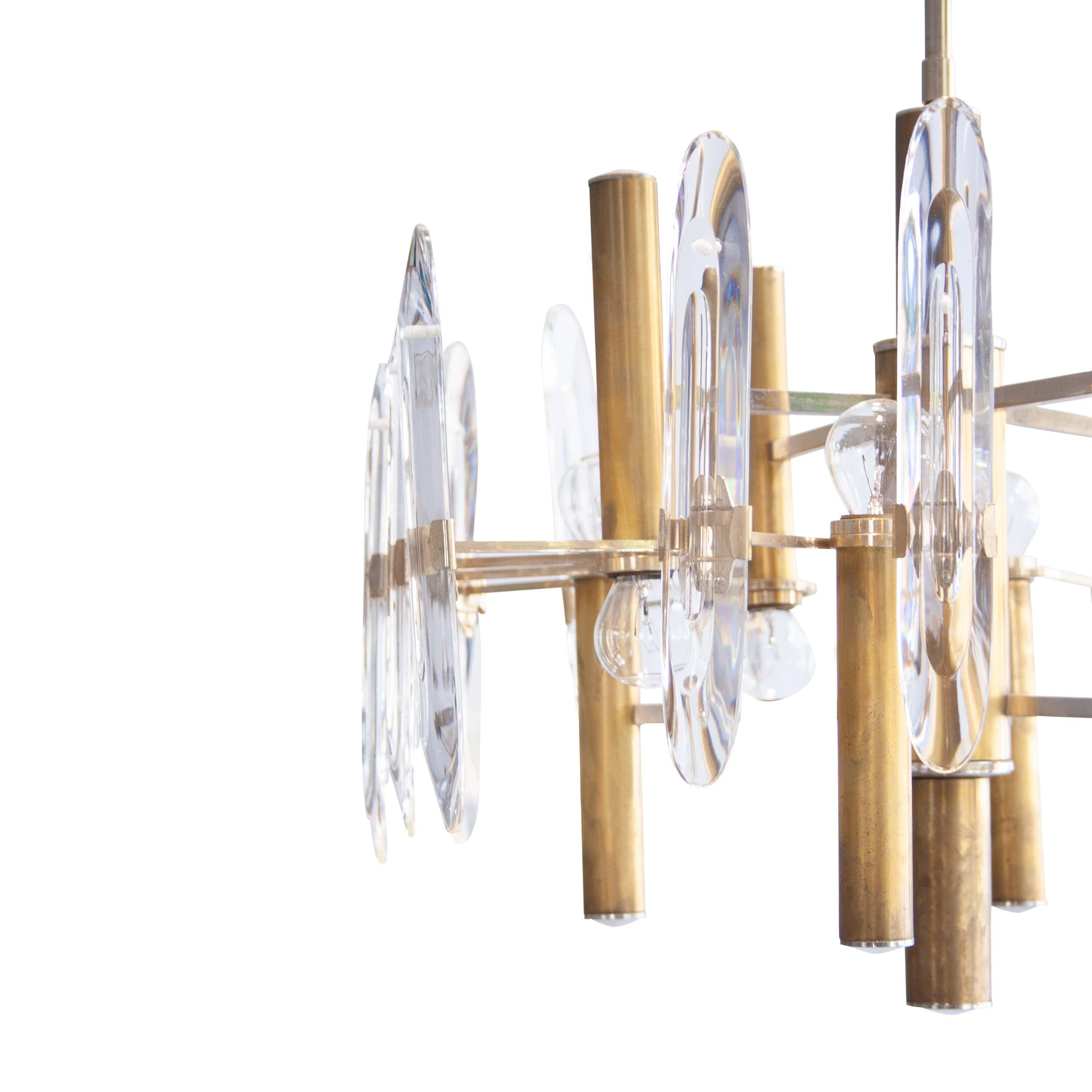 Gaetano Sciolari's Italian chandelier from the 1960s.
The chandelier consists of eight brass arms and glass pendants that attach to each arm. The light bulb placement alternated up and down.
    