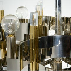 Lampadario a 12 luci in ottone, cromo e lucite di Gaetano Sciolari