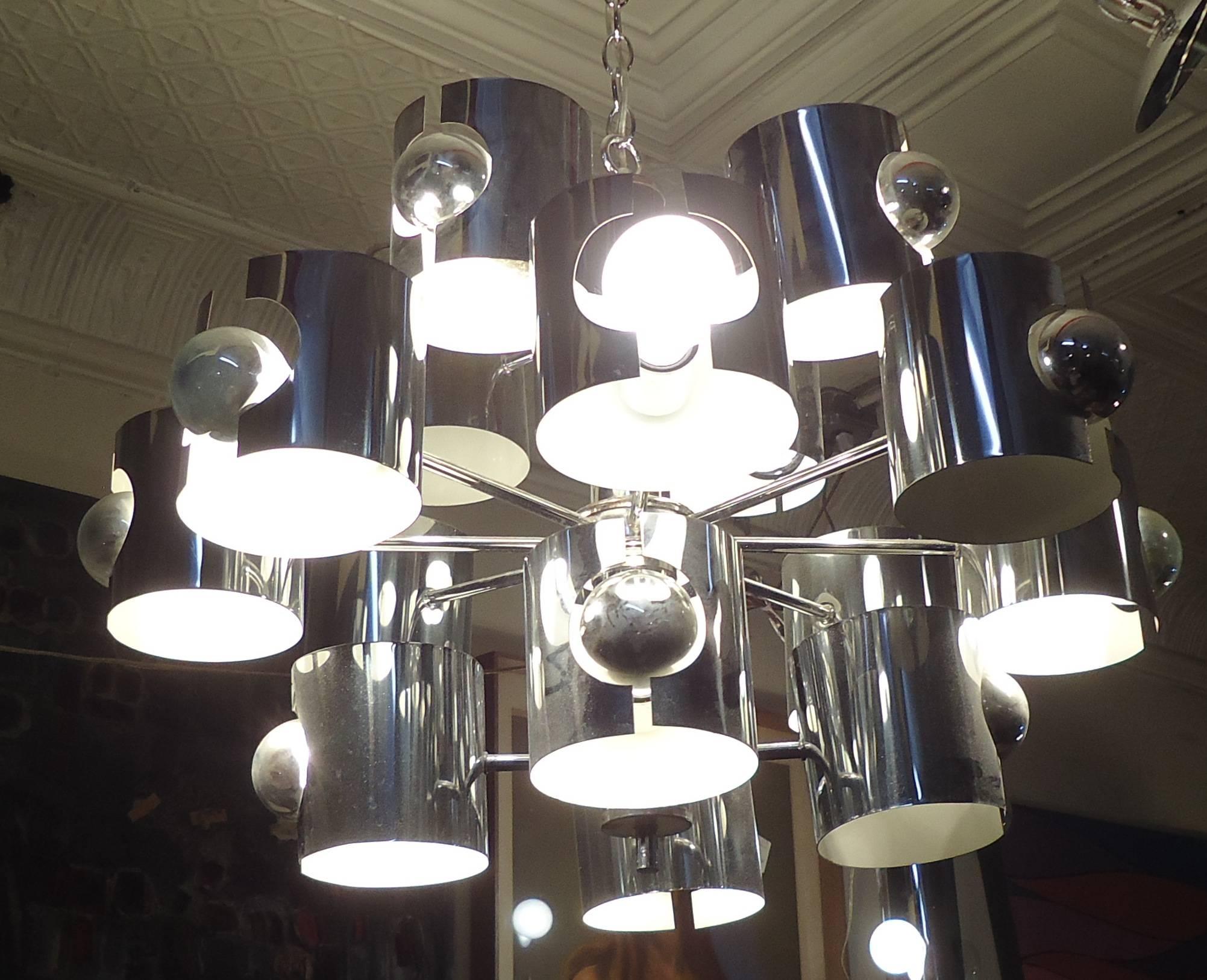 Mid-Century Modern chromed chandelier by Sciolari with white lacquered enameled shades. 

(Please confirm item location NY or NJ with dealer).
 