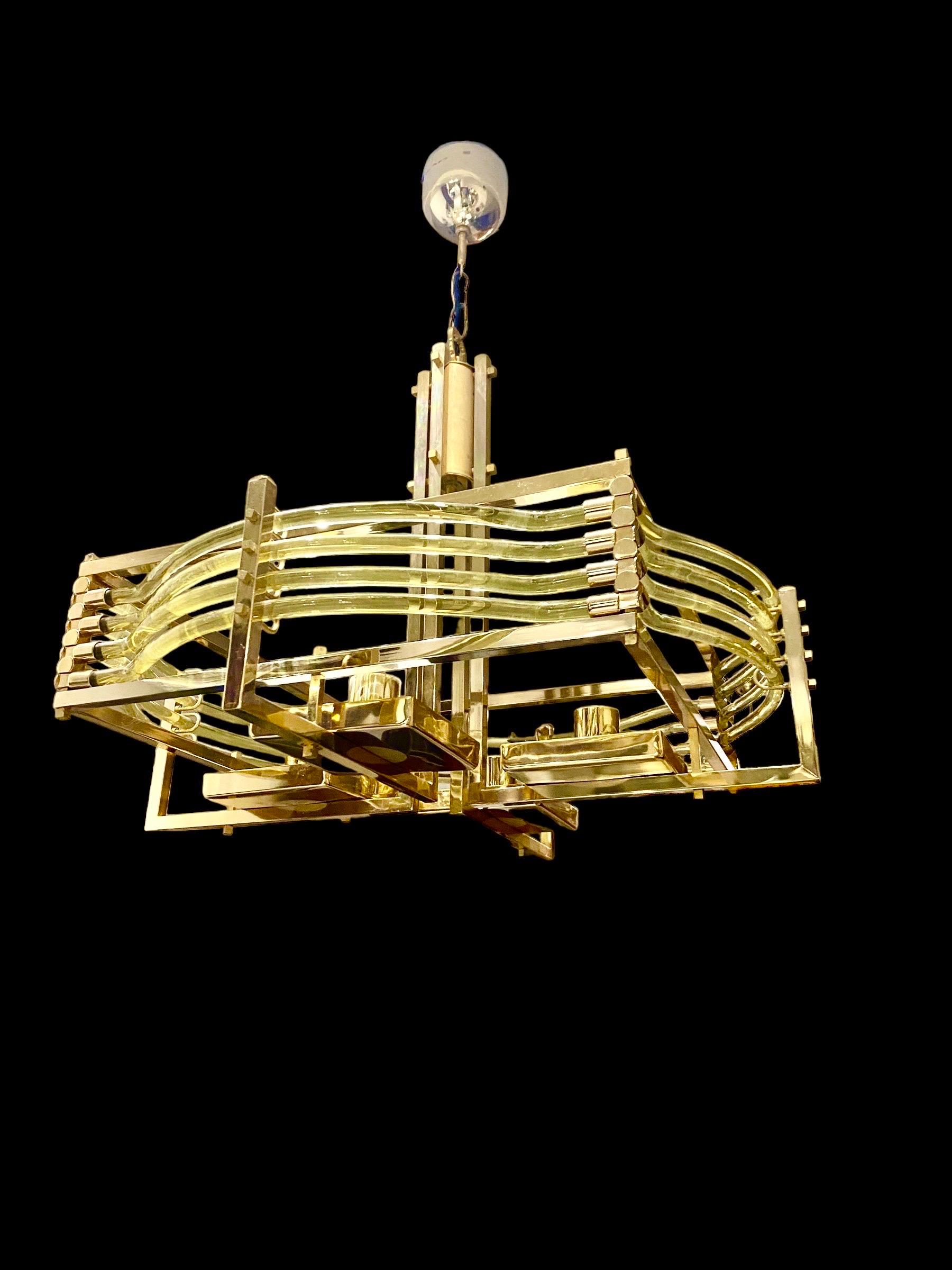 Exceptional Gaetano Sciolari with yellow glass Murano oversized with gilt gold structure. The Design and the quality of the glass make this piece the best of the italian Design.
This unique Model in Gold with yellow glass murano are exceptional