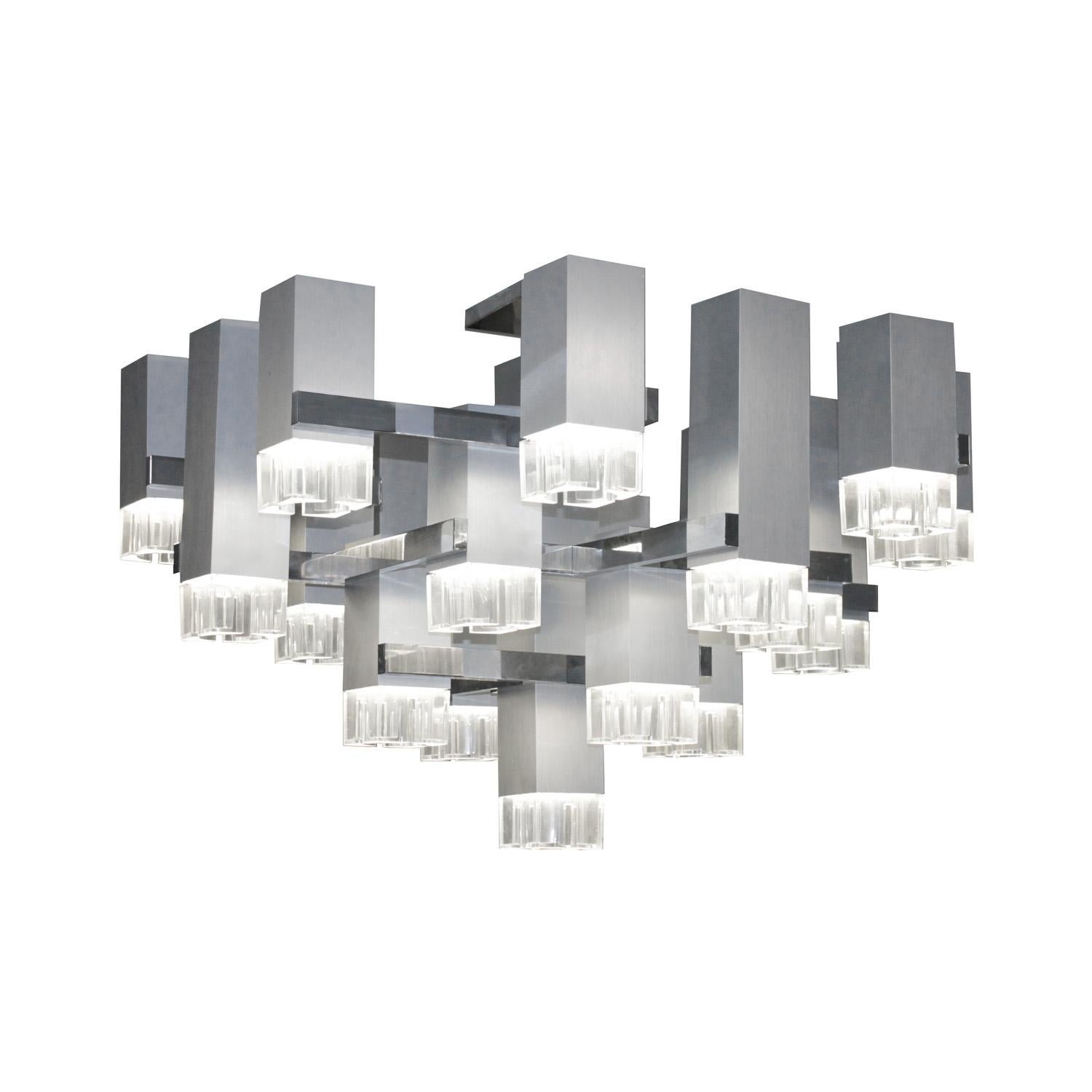 Impressive aluminum and polished chrome Cubist chandelier with acrylic lamps designed by Gaetano Sciolari. Italy, 1970's