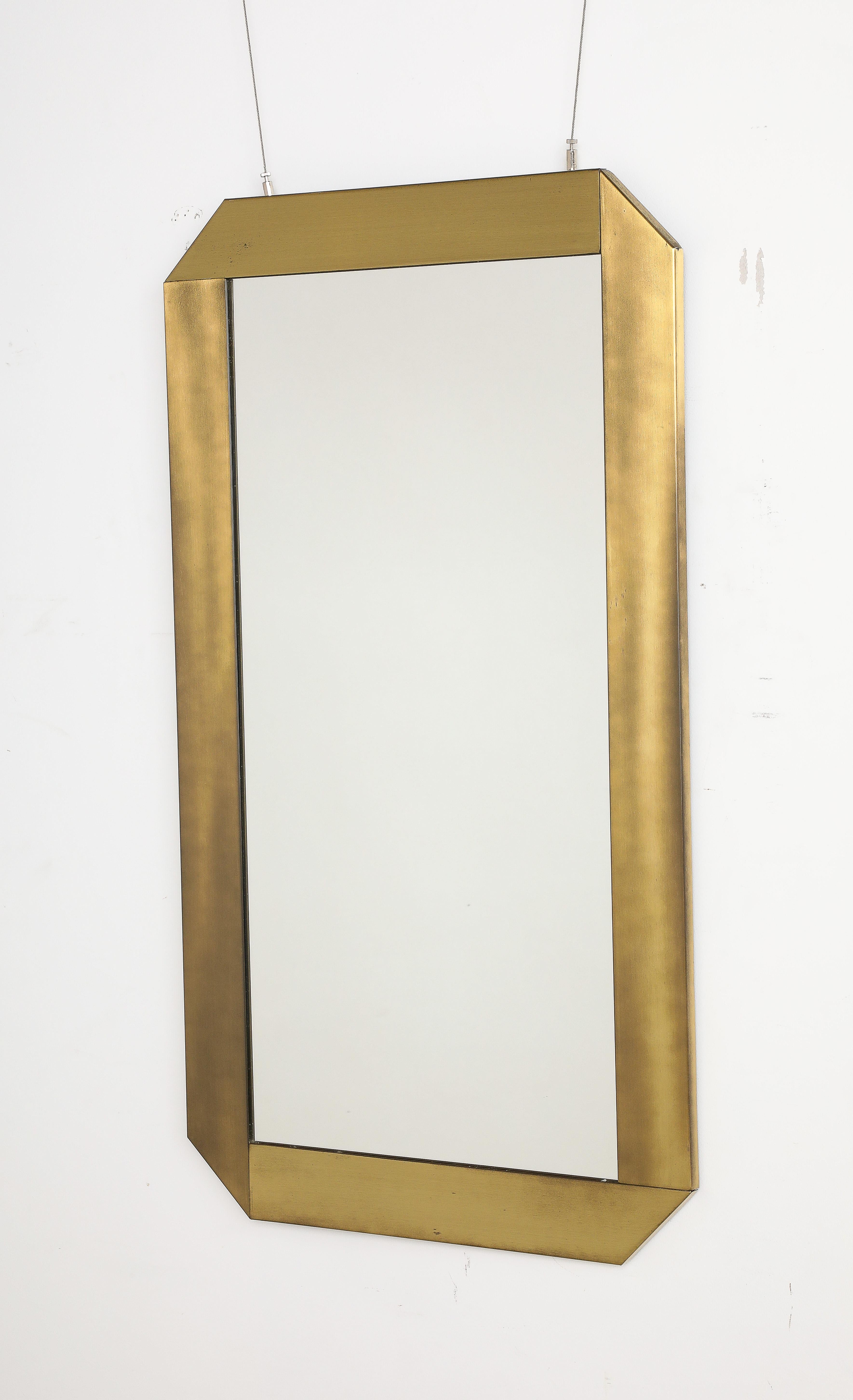 Gaetano Sciolari for Valenti Milano Brushed Brass Wall Mirror, Italy, circa 1970

An Italian 1970's brushed brass rectangular wall mirror with canted corners, designed by Gaetano Sciolari for Valenti Milano. The brass a warm and rich coloring,