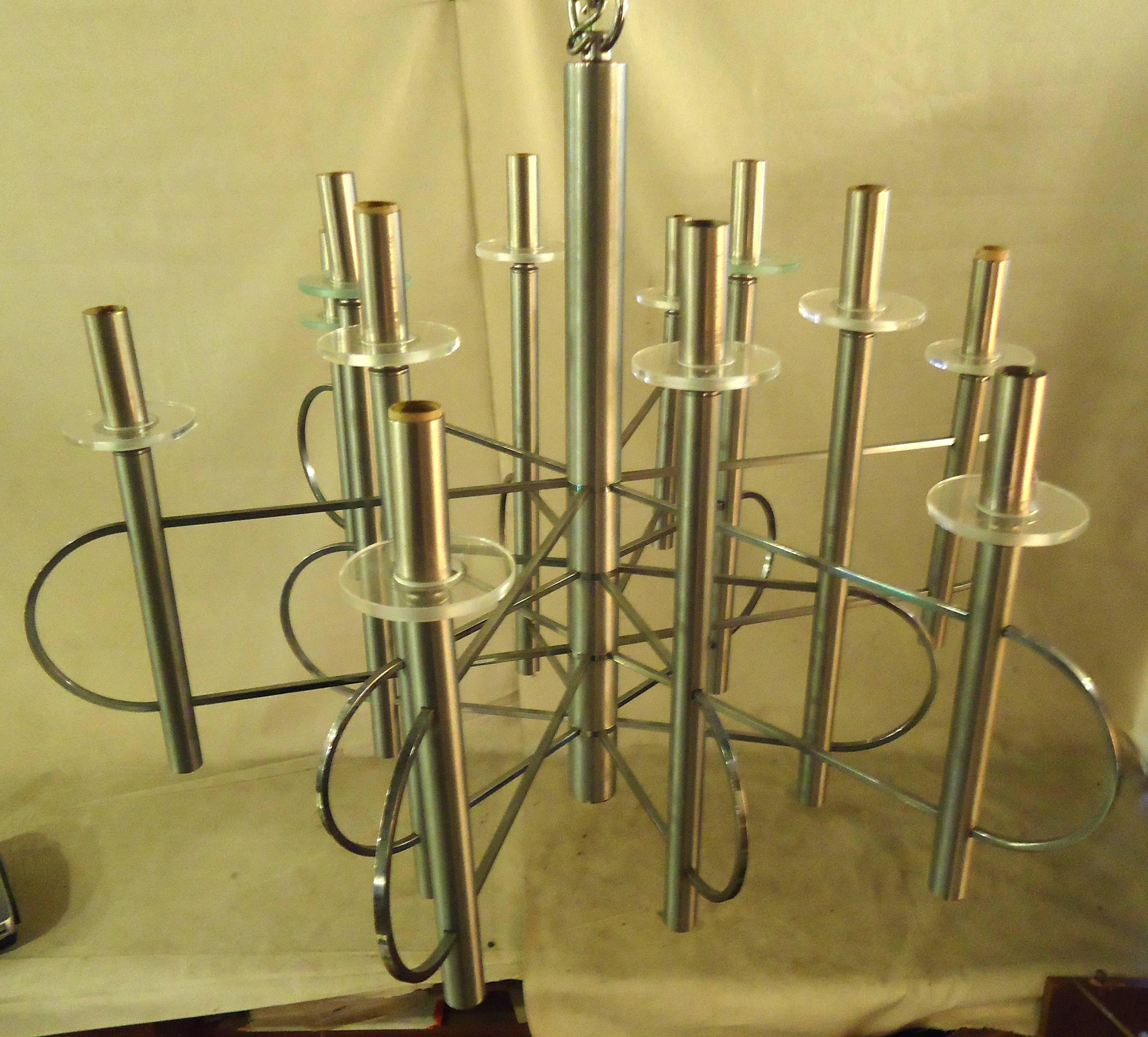 Vintage modern 24 bulb chandelier featuring sculpted chrome frame with glass trim, designed by Gaetano Sciolari. 
Please confirm item location NY or NJ with dealer.
