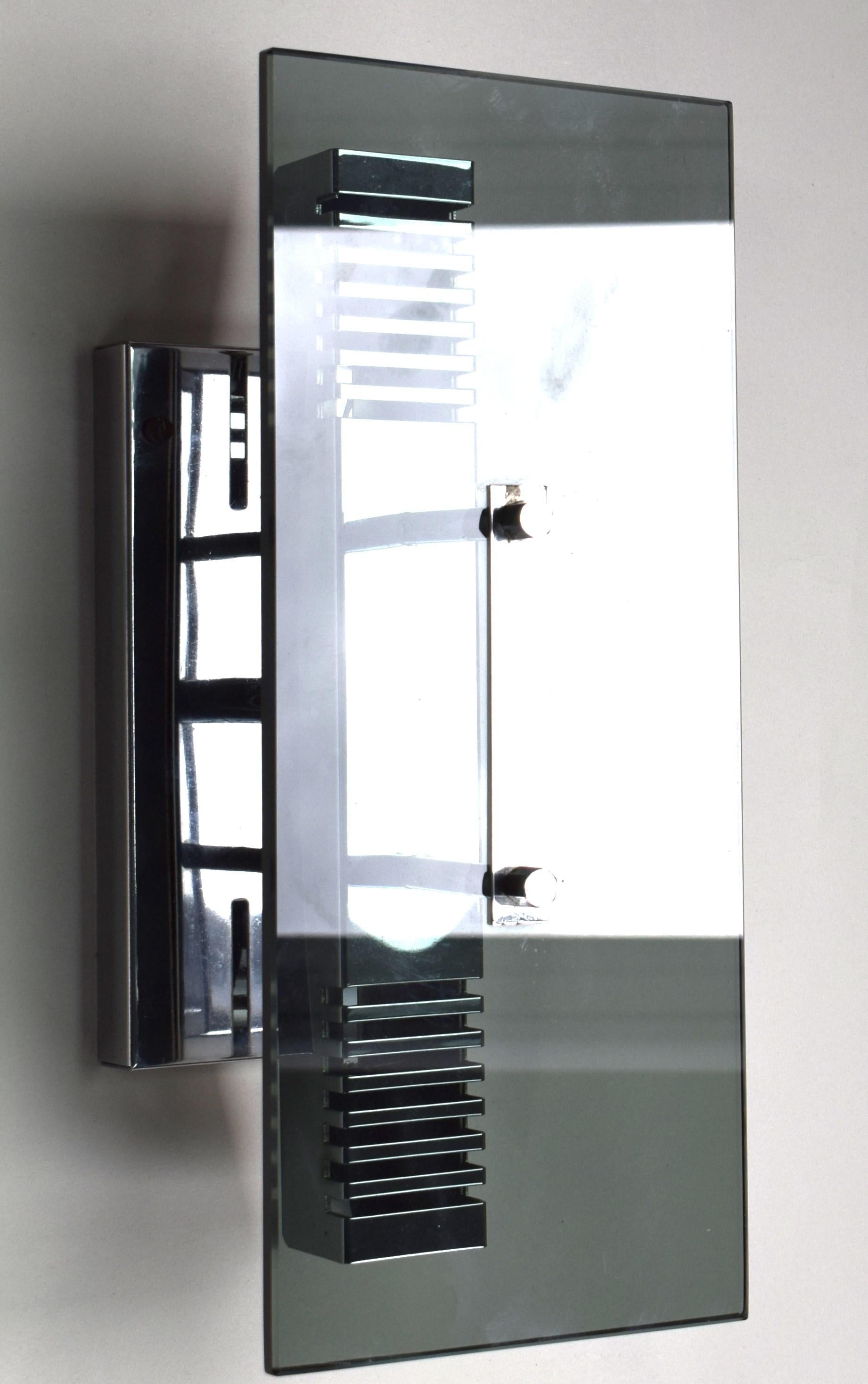 Chrome-plated brass chandelier with twot E14 bulbs up to 60 watts, designed by Gaetano Sciolari in the 1970s (attributed). One solid, green-tinted glass plate.
