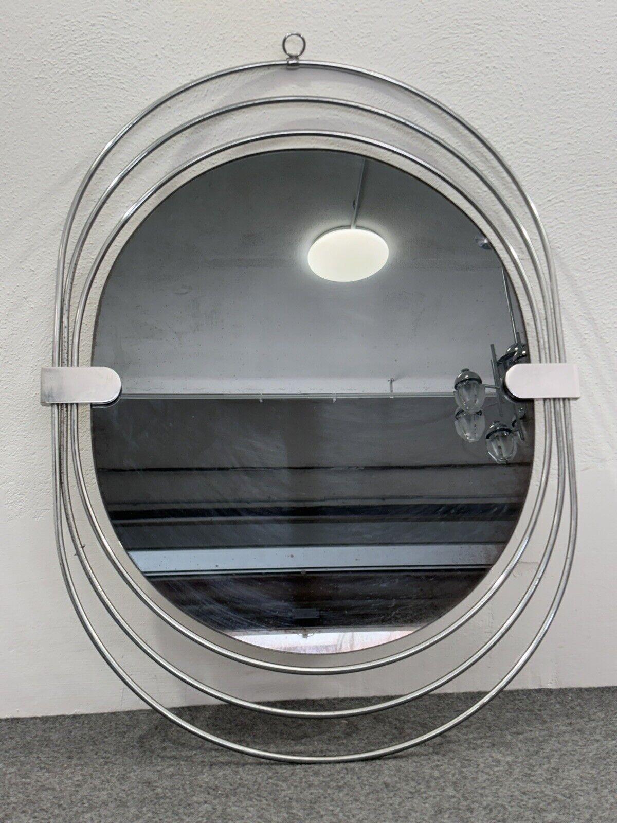 Gaetano Sciolari Specchio Ovale Da Parete Design Modernariato 1970's.

Structure en acciaio cromato, vetro ovale fumé.

L'articolo in buone condizioni conservative, sono presenti lievi ed ovvi segni del tempo dovuti all'utilizzo e all'età e qualche
