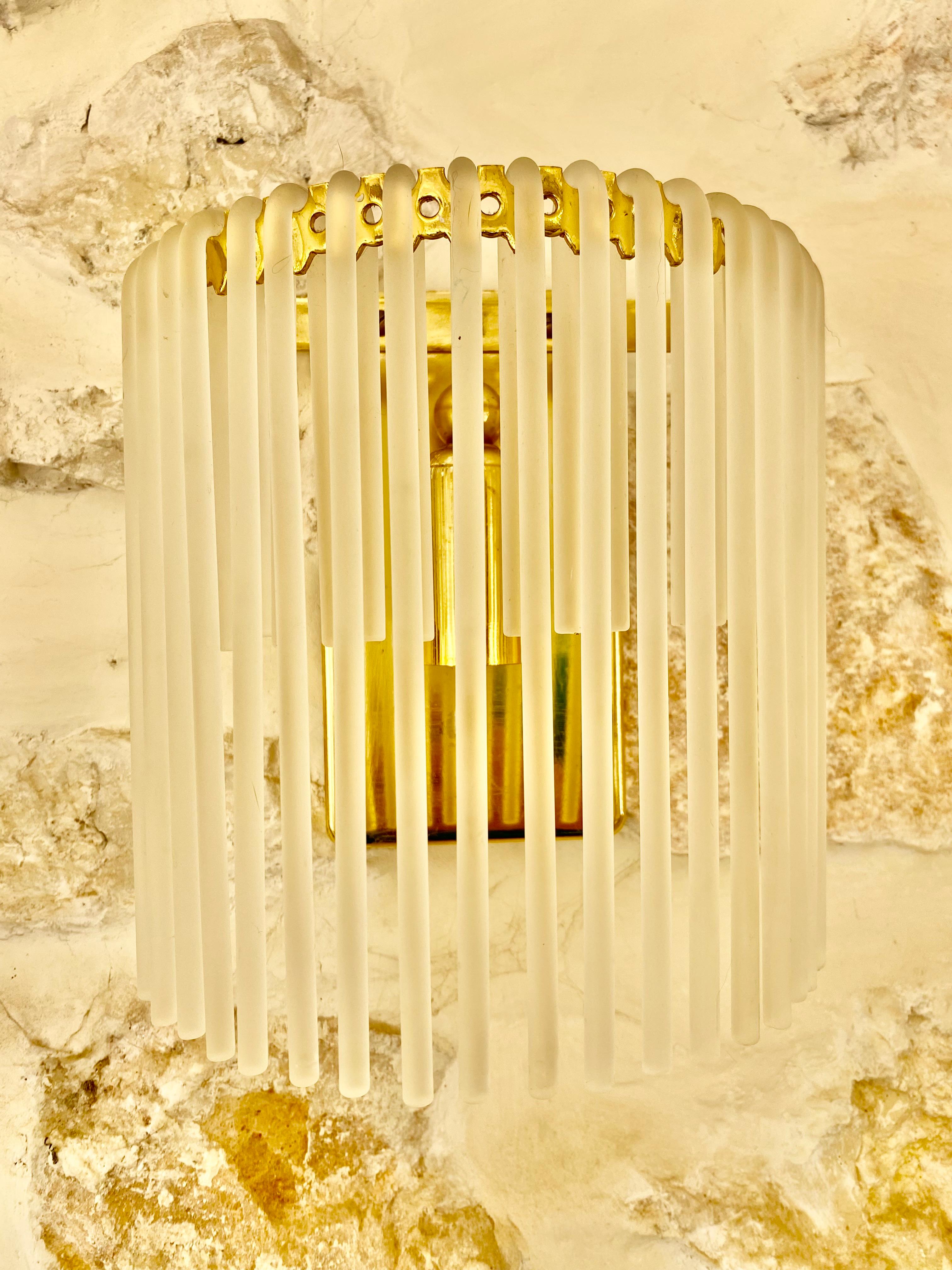 Gaetano Sciolari wall lighting with glass with brass structure . The Design and the quality of the glass make this piece the best of the italian Design.
This unique Gaetano Sciolari wall lighting in ice frost glass are exceptional.

Gaetano