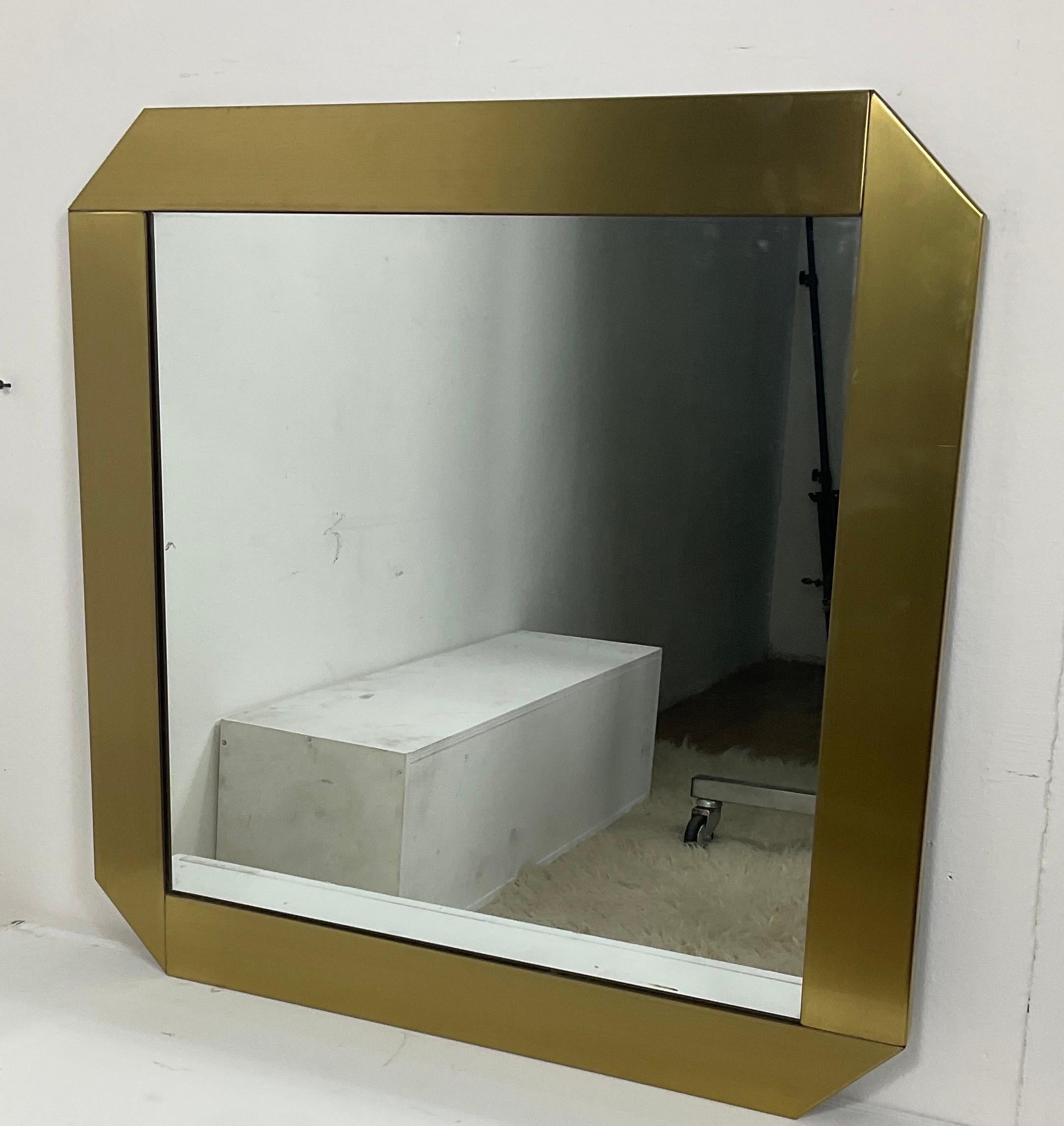 Gaetano Sciolari's 70s mirror for Valenti Luce in silver crystal and brushed brass metal frame.