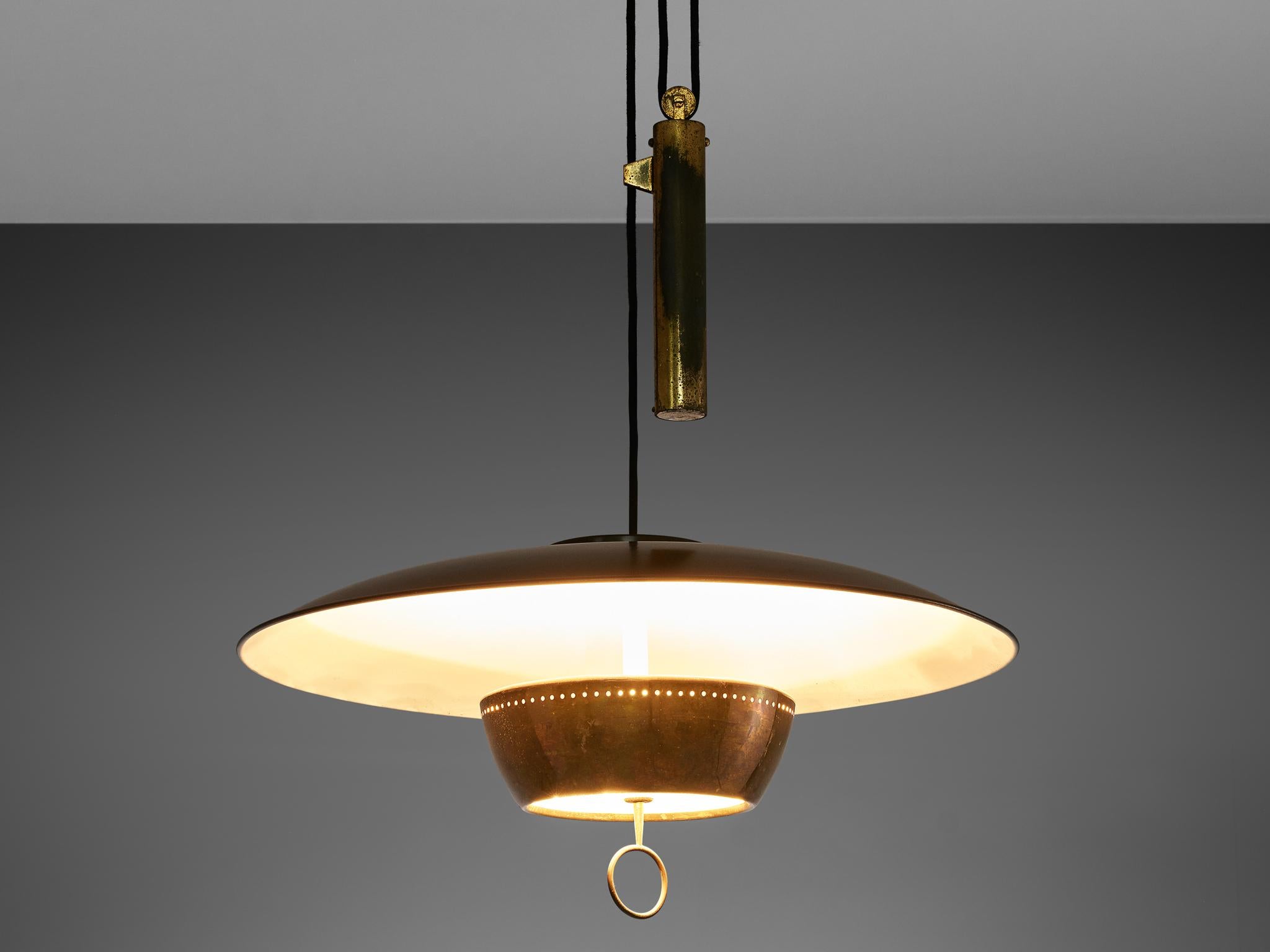Gaetano Sciolari for Stilnovo, ceiling light model A5011, metal, brass, Italy, 1950

Elegant dynamic and modern pendant by Sciolari for Stilnovo. Adjustable in height due the counterweight. The light gets beautifully reflected by the white inside of