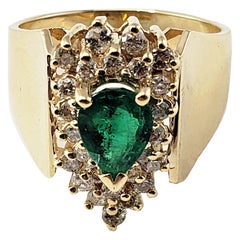 Retro 14 Karat Yellow Gold Emerald and Diamond Ring