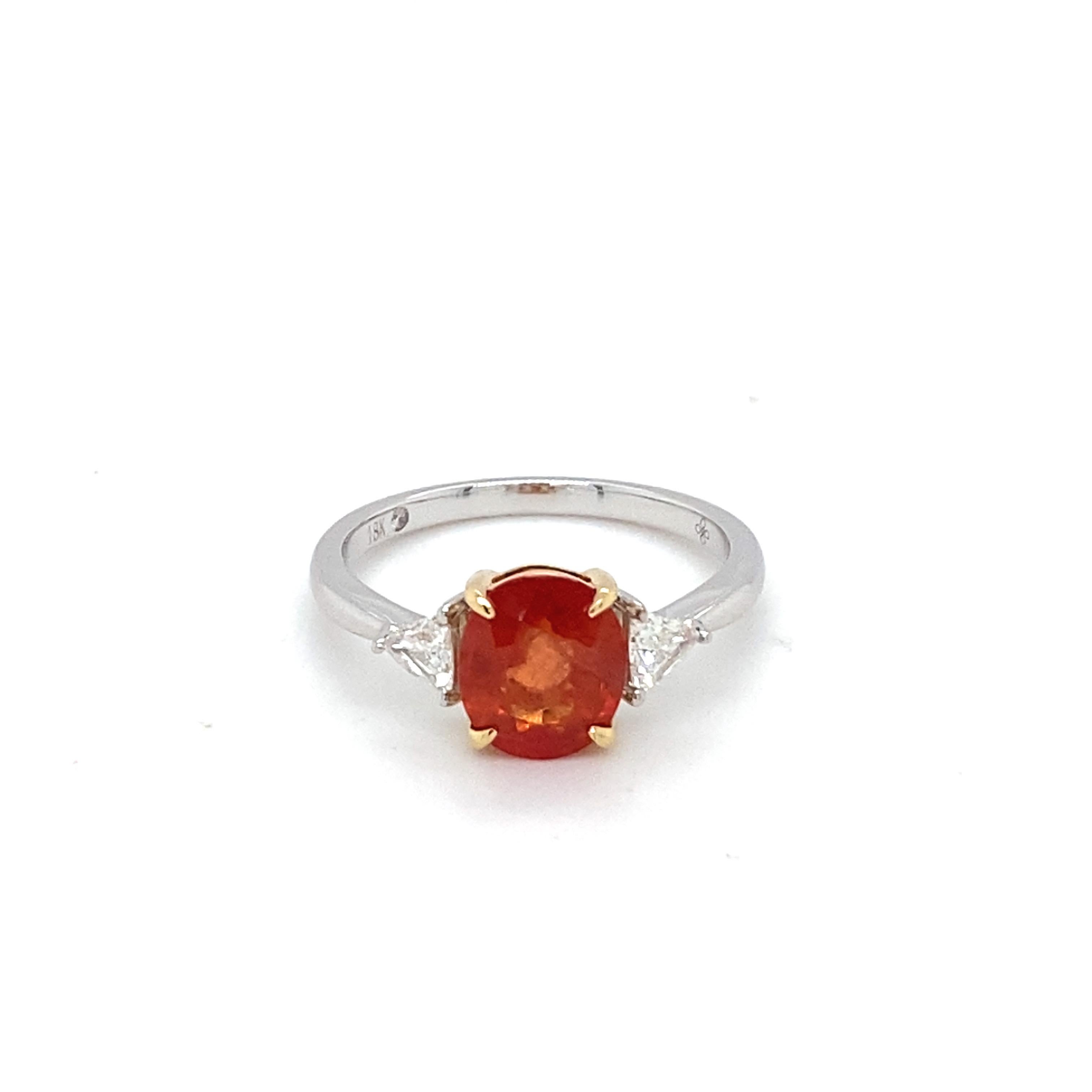 This beautiful orange sapphire ring is adorned with two trillion east west diamonds. Crafted in 18K two tone gold symbolizes luxury and grace. Perfect for all occasions and can be cherished for ages.
Weight of Sapphire: 2.07 Carat
Weight of Diamond: