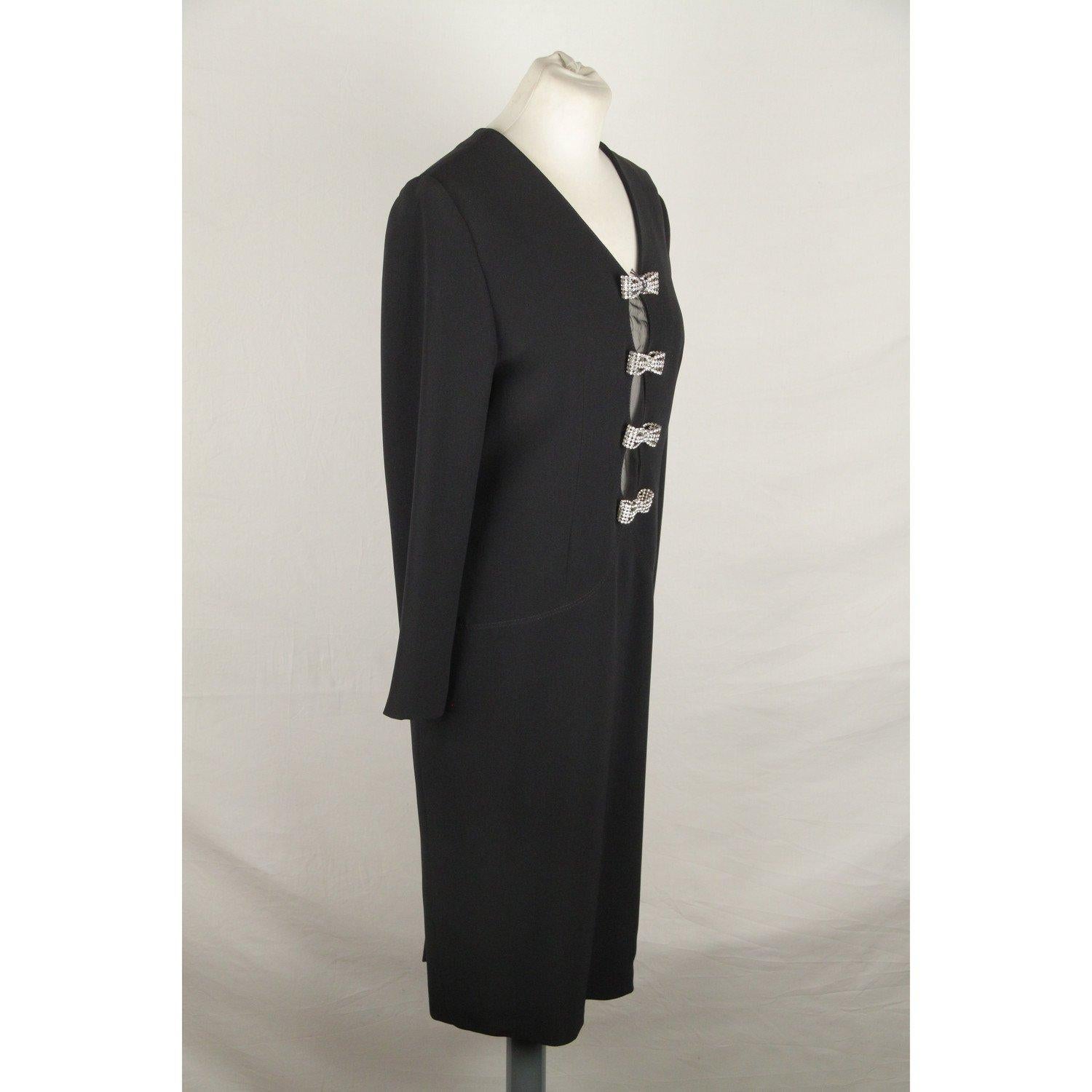 MATERIAL: Acetate COLOR: Black MODEL: Little Black Dress GENDER: Women SIZE: Medium CONDITION RATING: A :EXCELLENT CONDITION - Used once or twice. Looks mint. Imperceptible signs of wear CONDITION DETAILS: Gently used MEASUREMENTS: SHOULDER TO