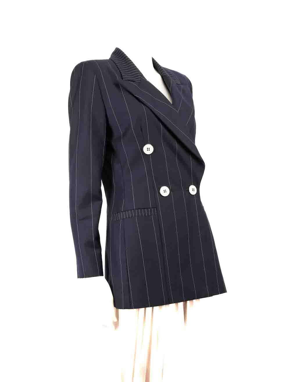 CONDITION is Very good. Hardly any visible wear to blazer is evident on this used Gai Mattiolo designer resale item.
 
 
 
 Details
 
 
 Navy
 
 Wool
 
 Blazer
 
 Pinstripe pattern
 
 Double breasted
 
 Shoulder pads
 
 Button up fastening
 
 3x
