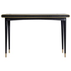 Gaia Console in liquid 
Solid Brass, Blackened Oak 
Corian, Handmade in Uk