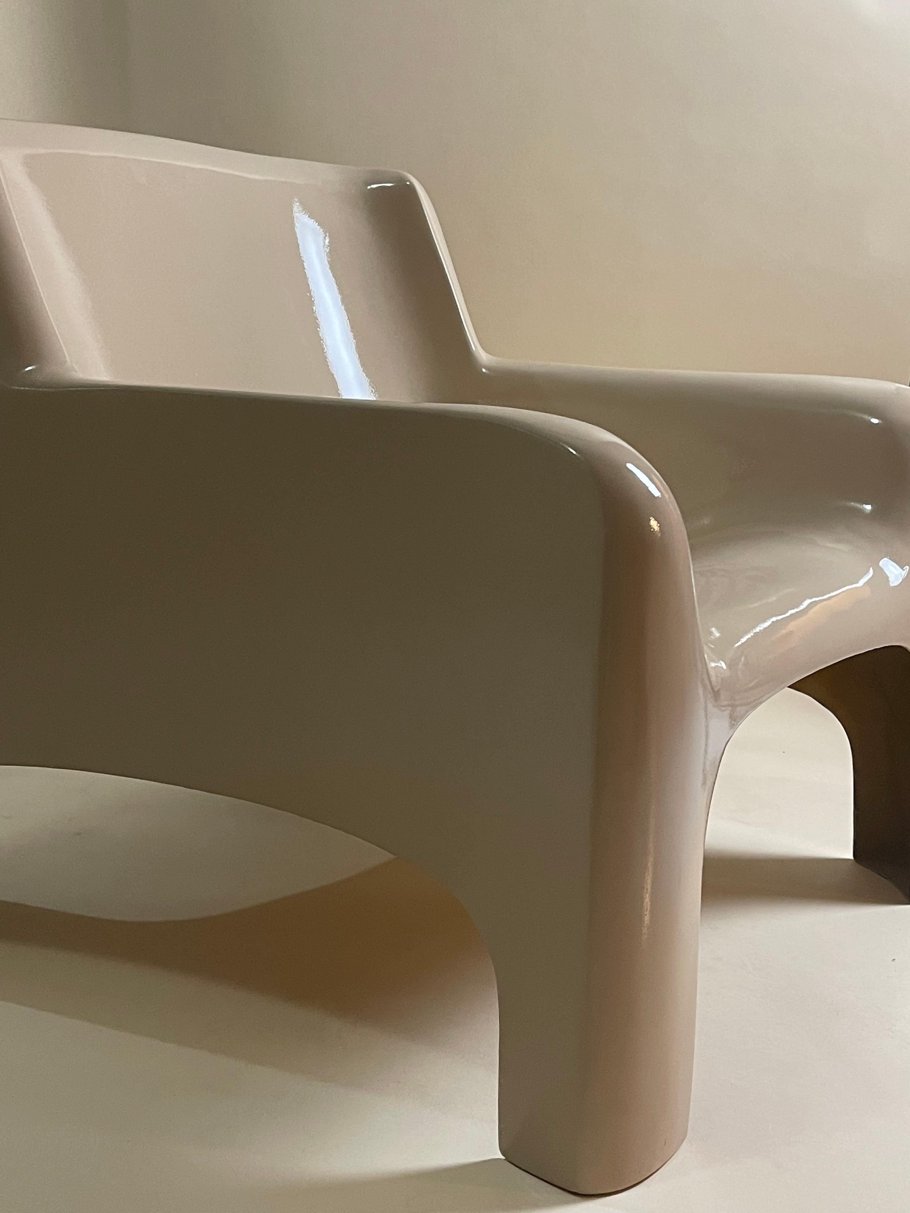 Rare Carlo Bartoli for Arflex Gaia chair in a cappuccino color. This unique design ensures equal weight distribution for the sitter resulting in a higher than expected comfort level.