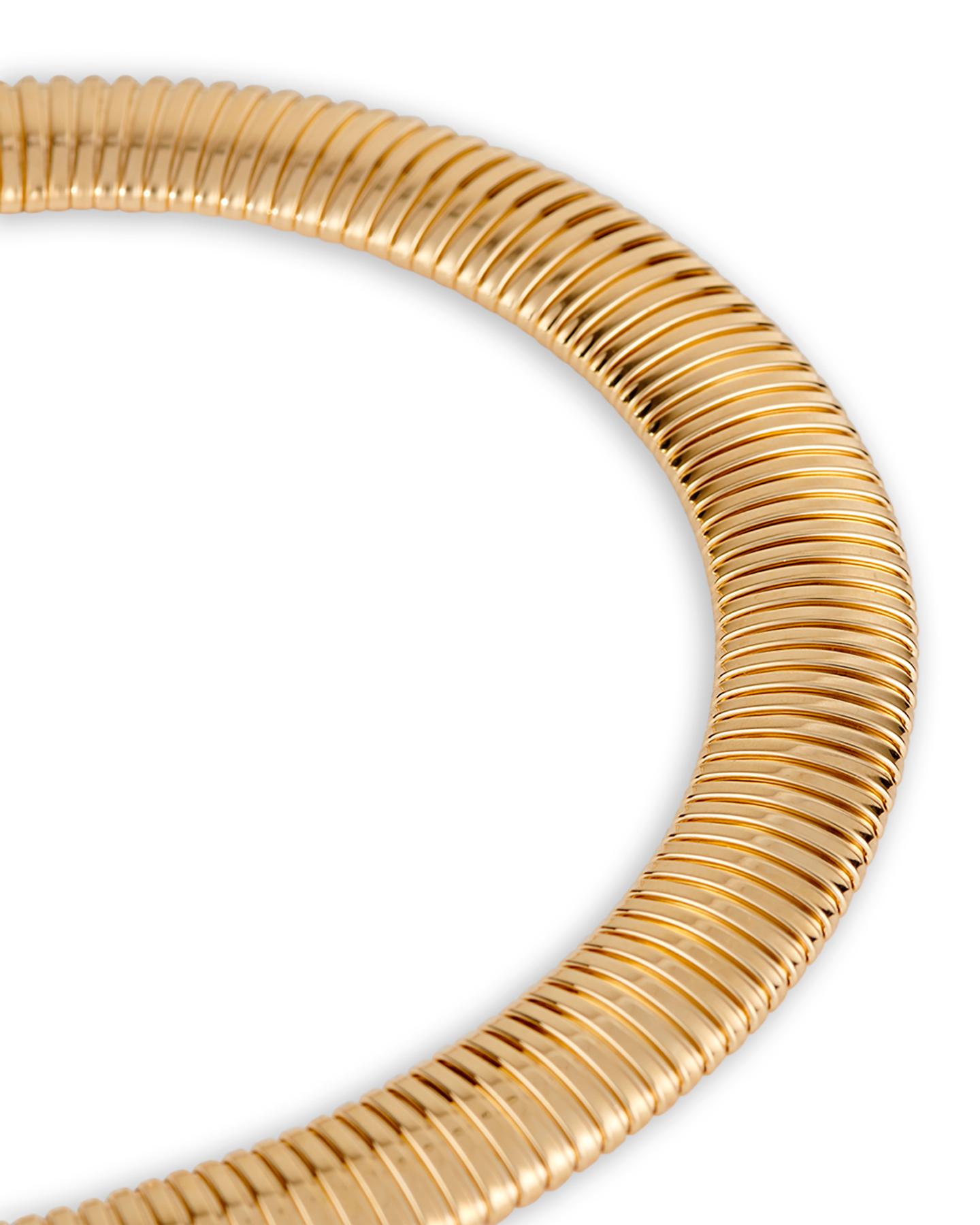 Realizzata con la classica tecnica Tubogas, la collana Gaia placcata in oro ha una silhouette flessibile e un peso delicato. Questo pezzo forte è una scelta elevata per tutti i giorni.

Dettagli: 
Argento 925
Placcato in oro giallo 18 carati
Peso: