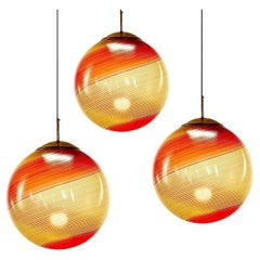 Gaia Trittico, Set of 3 Murano Amber and Red Filigrana pendants Piattelli Design