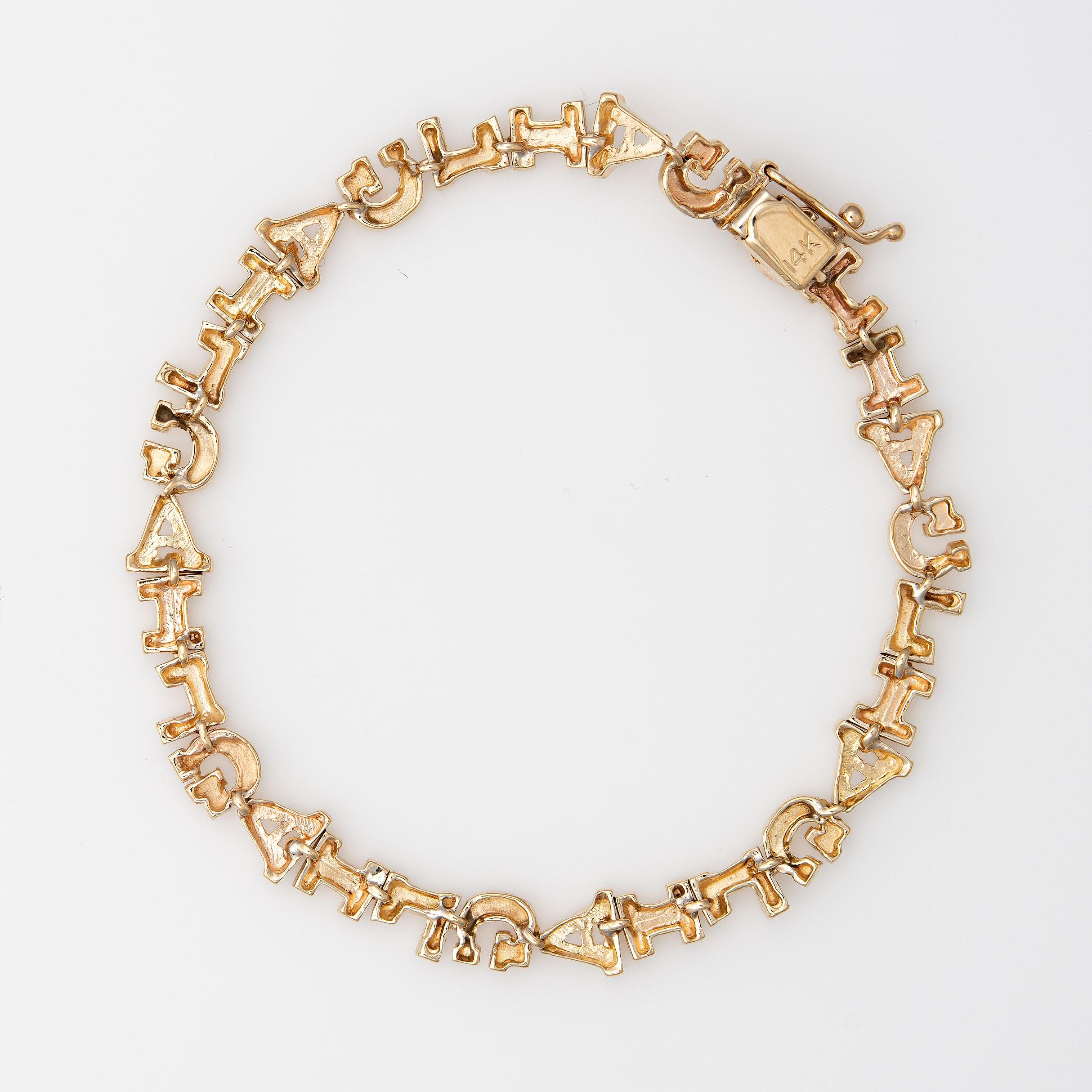 Distinct 'Gail' vintage nameplate bracelet crafted in 14k yellow gold. 

The bracelet makes a great statement on the wrist. If you name is 'Gail' you are in luck! The bracelet features a slip lock closure and safety chain. Ideal worn alone or