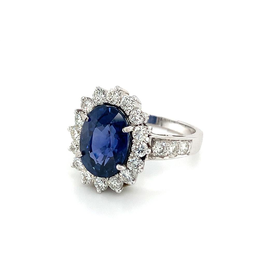 Natural GAL Certified 4.46 Carat Blue Sapphire with 1.15 Carat Diamond Ring set in 18 Kt white gold. 