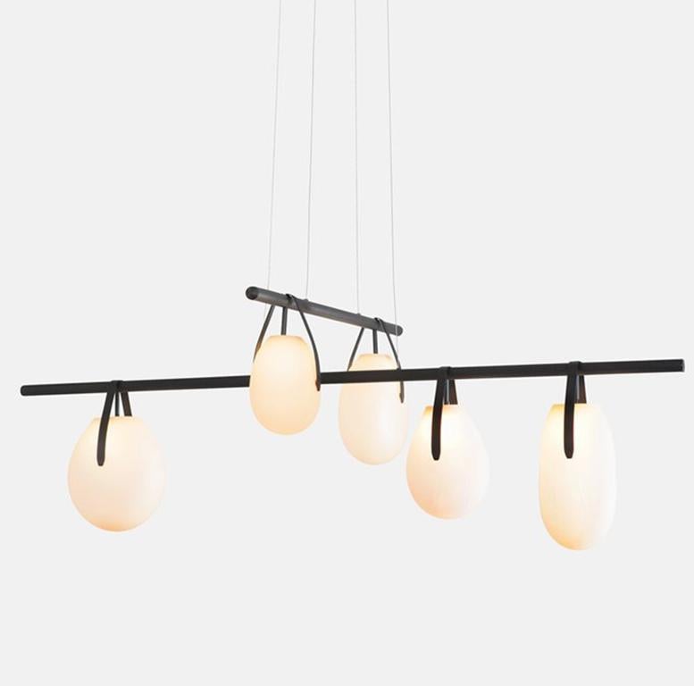 A modular system for dining room or public spaces. A variety of handblown frosted globes hung from an aluminum beam, dimmable LED light source, black finish.

Includes Gala Chandelier 4210 & Gala Chandelier 7220