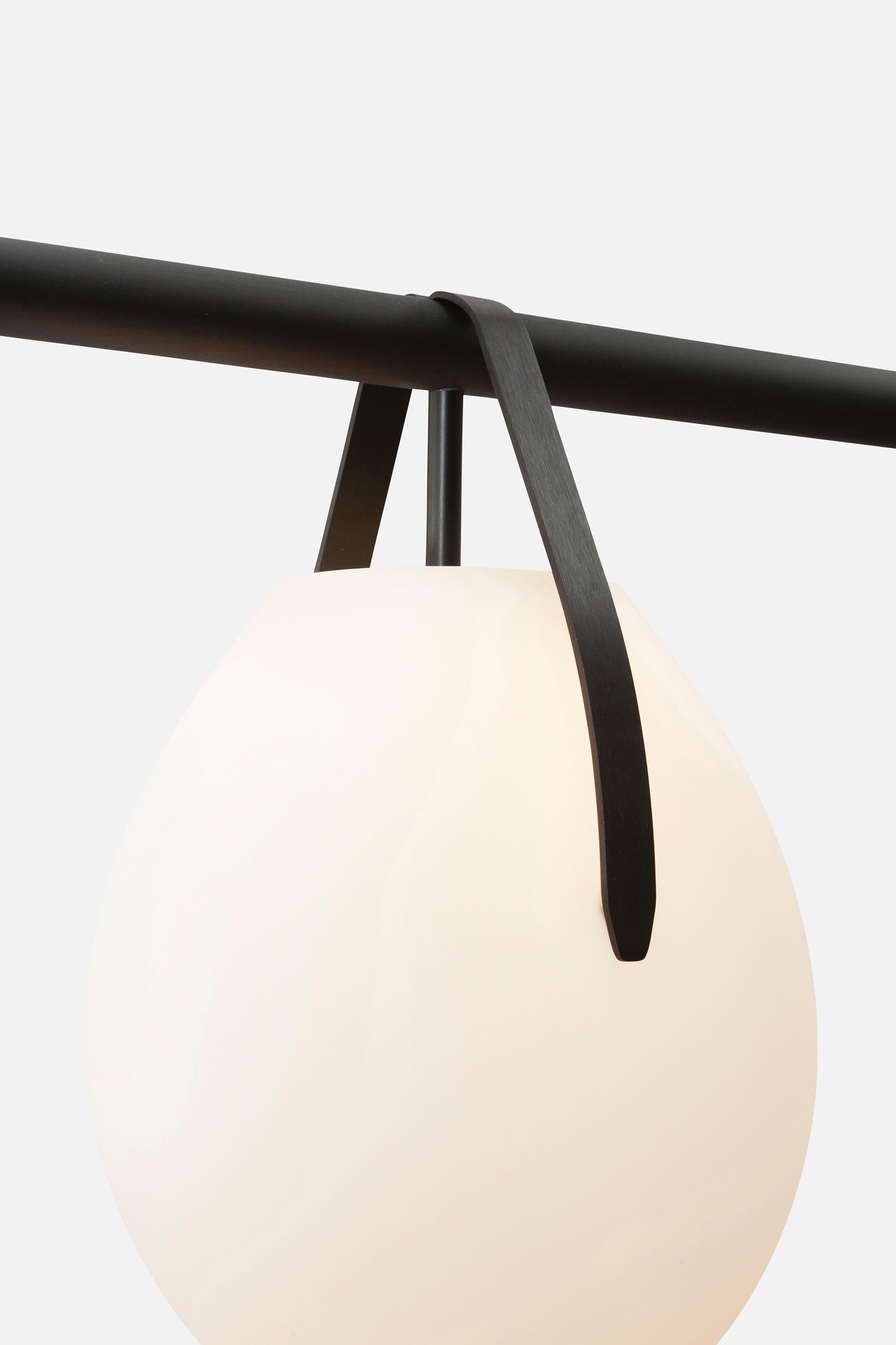 Modern Gala Cross Chandelier by RBW in Frosted Glass Globes and Matte Black Aluminum For Sale