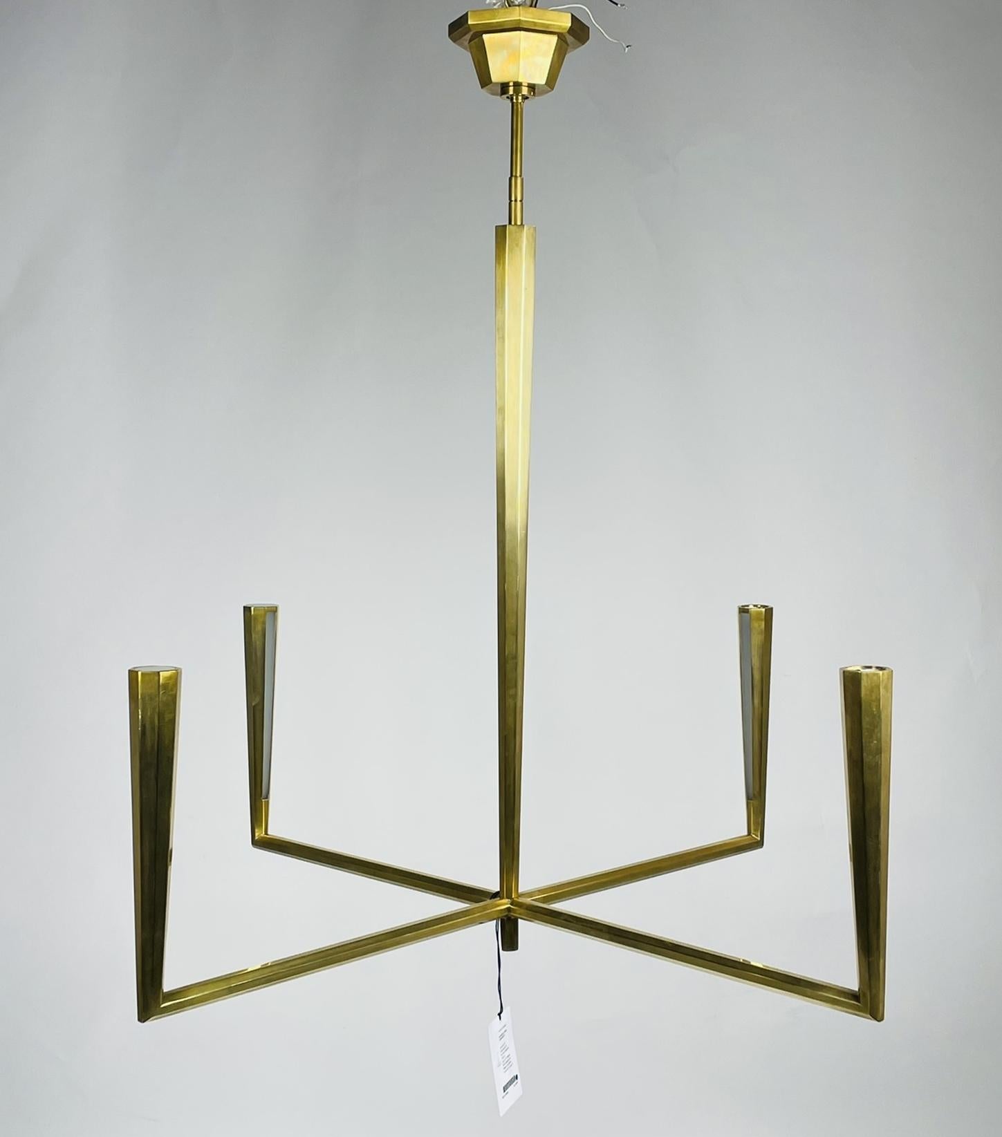 Eye-catching sleek metal lines define the Galahad by Thomas O'Brien. The minimalist aesthetic is at once modern and timeless.
Crafted from solid sculpted and welded brass, the refined fixture will add a soft glow to any