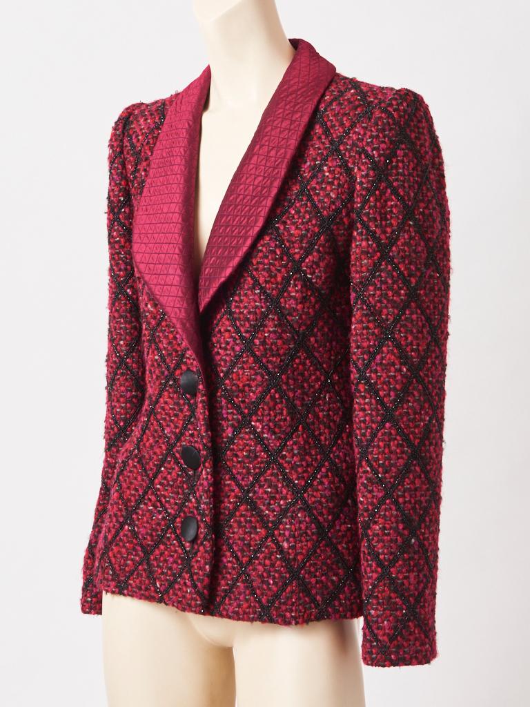 Galanos, red and black with subtle touches of grey, wool, tweed, fitted, evening jacket having black, jet beading, embroidered in a diamond pattern. Jacket has a silk, quilted, shawl collar, with black satin button closures. Interior is lined in a