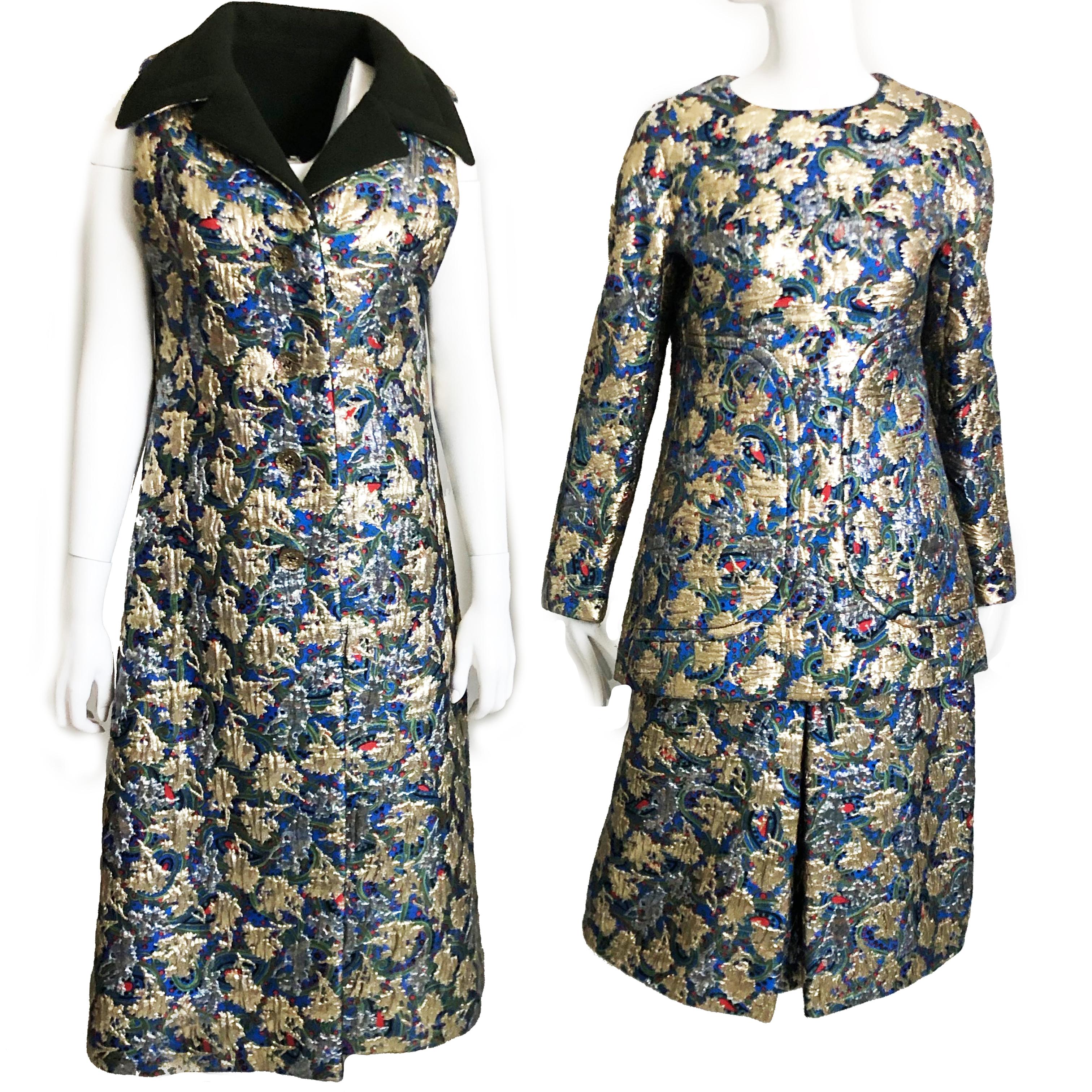 Gorgeous vintage 60s 3pc Long Vest, Top & Skirt, designed by James Galanos. The metallic brocade is simply fabulous! Wear together or pair with your other vintage pieces!  Outstanding quality on this set and it definitely brings a retro vibe!

Made