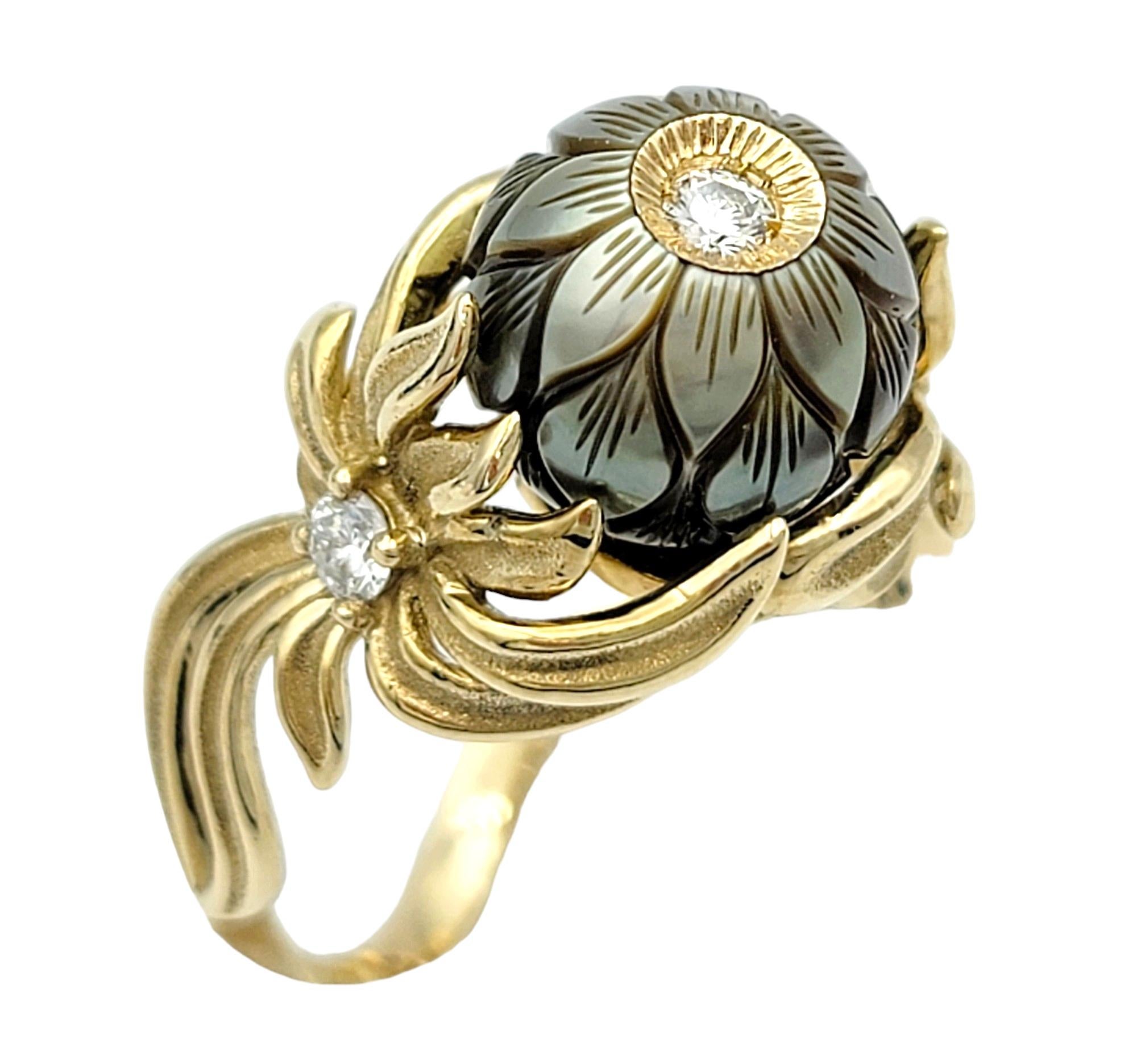 Ring Size: 8

This enchanting ring by Galatea is a captivating blend of elegance and nature-inspired beauty. At its heart lies a lustrous Chinese freshwater pearl intricately carved with a delicate flower motif, exuding a timeless charm and grace. A