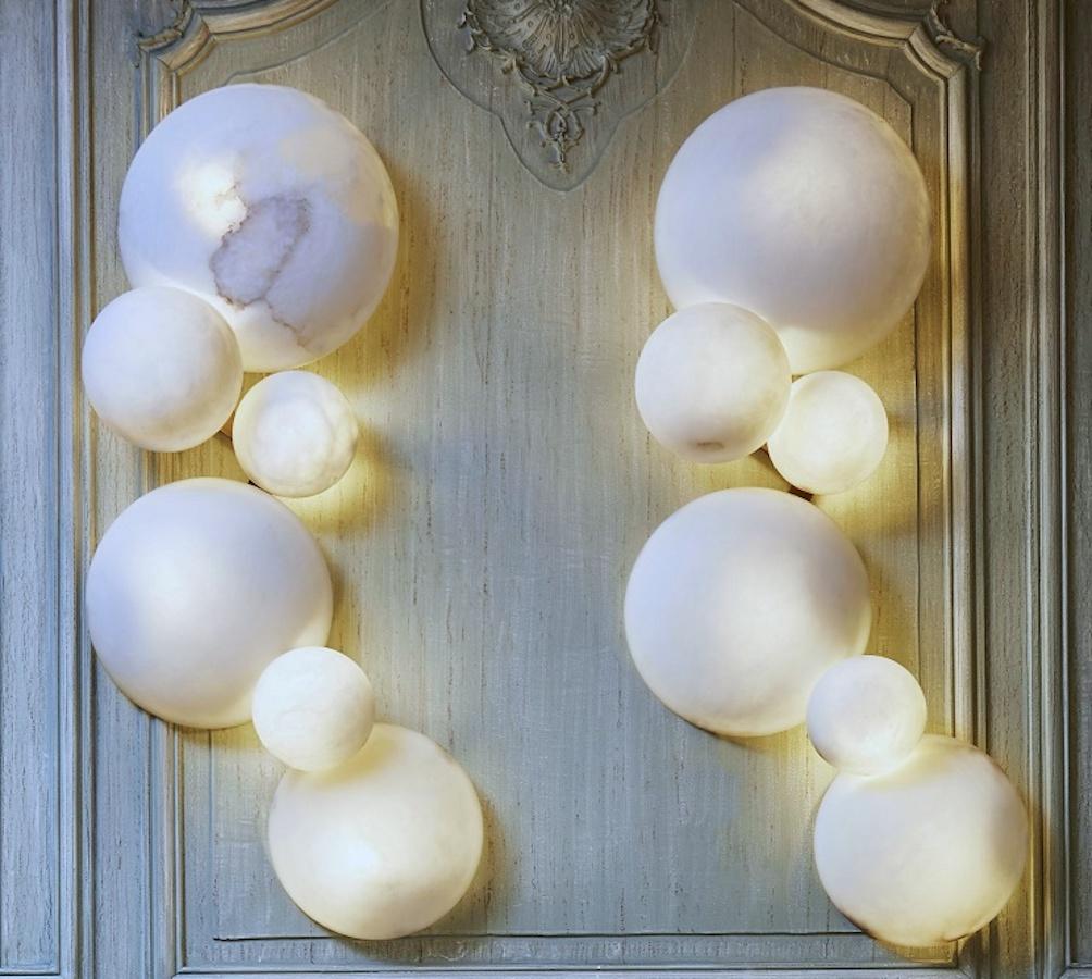 Striking contemporary Italian alabaster marble globe sconces or wall lights.
Exclusive production of Tuscany alabaster, handmade with great skill of Italian craftsmanship.
Price is for 1 item .

 