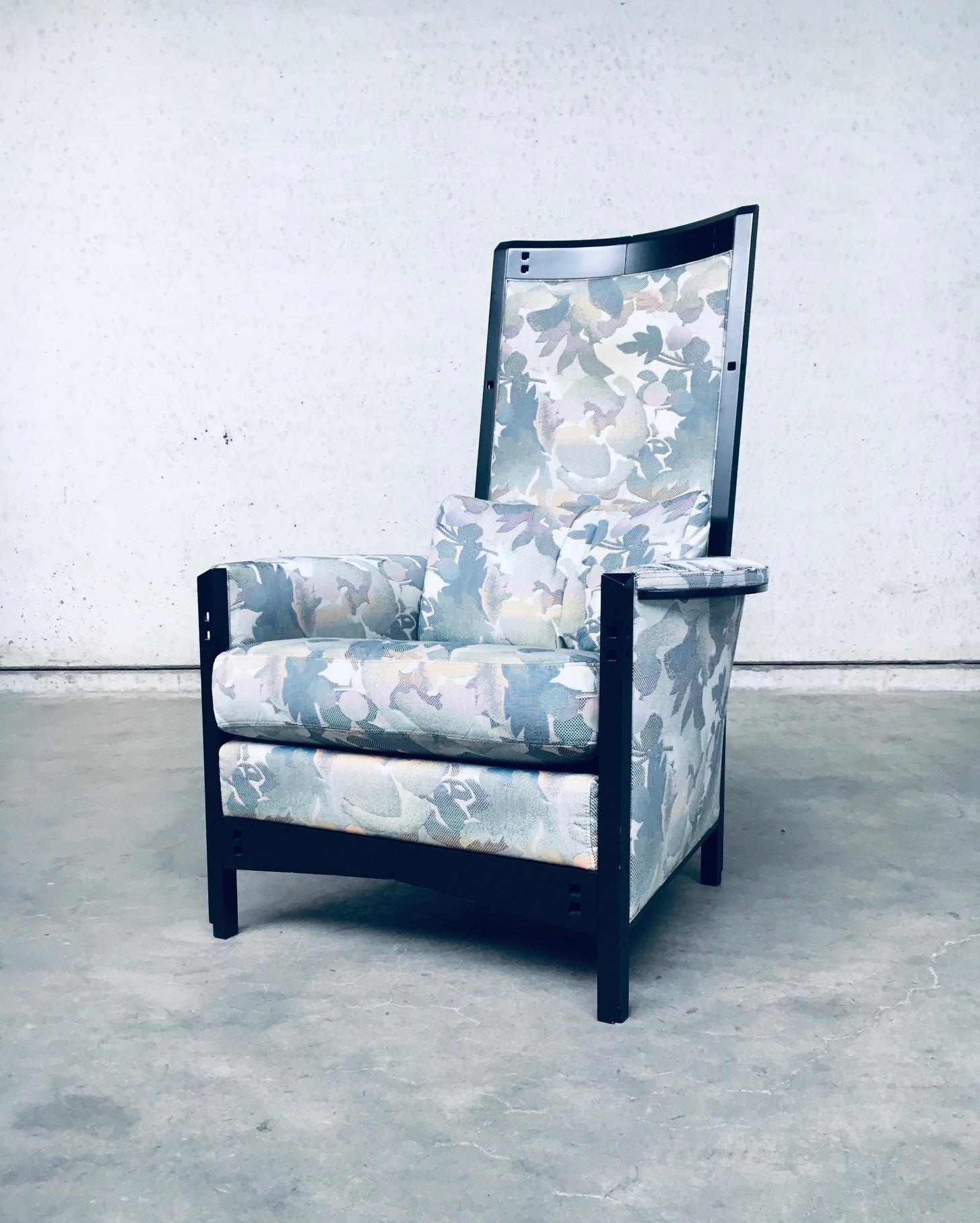 Postmodern Italian Design Galaxy series 'Peggy' High Armchair by Umberto Asnago for Giorgetti, made in Italy 1990's. Black laquered frame with blueish grey green flower fabric. Superb design in very good condition. All original fabric. Measures