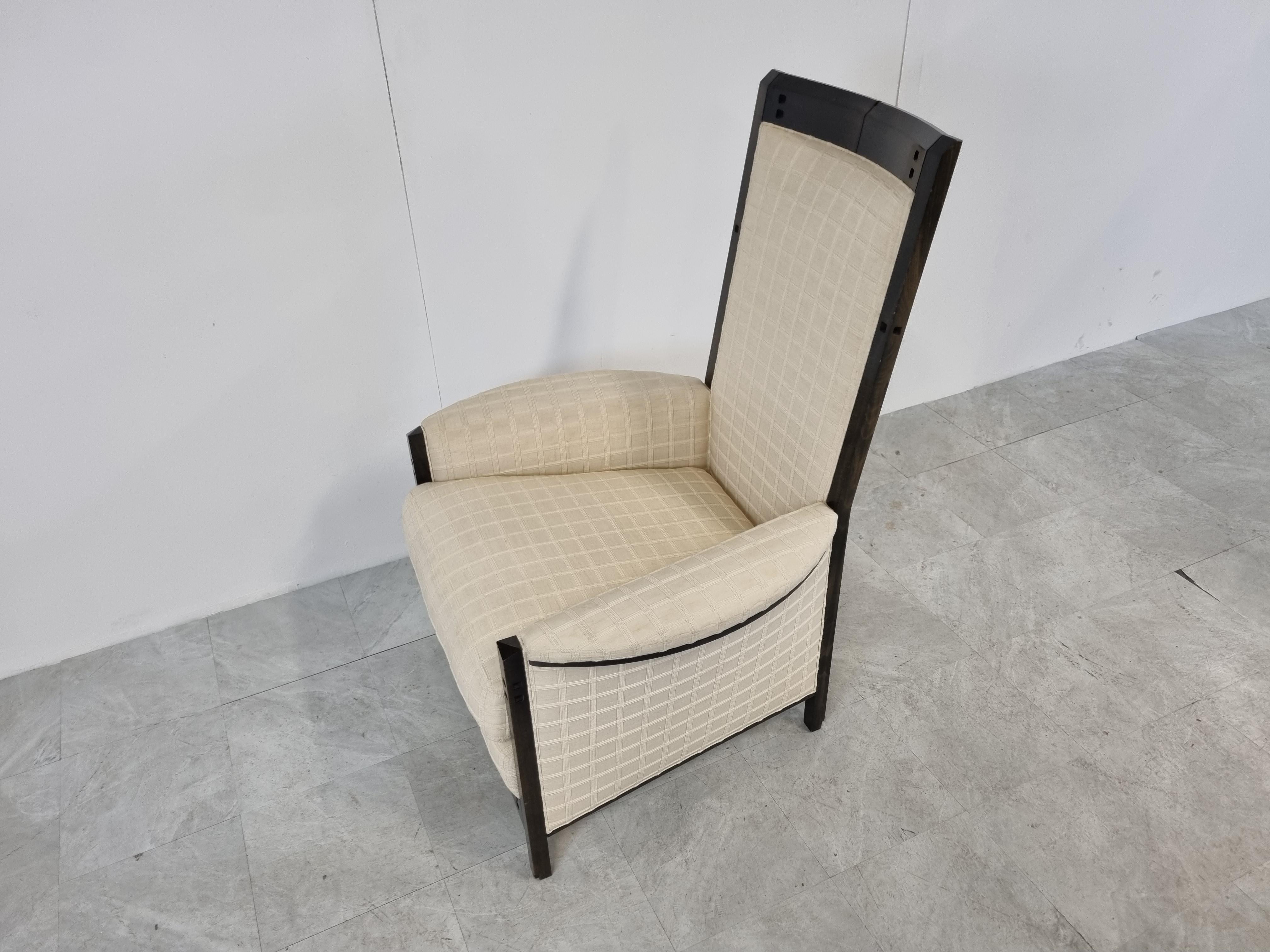 Rare Umberto Asnago high back armchair for renowned italian furniture maker 'Giorgetti'

Model 'Peggy' for the Galaxy series.

Use of fine wood with beige square motive fabric.

Original upholstery, no damages only user traces.

Timeless