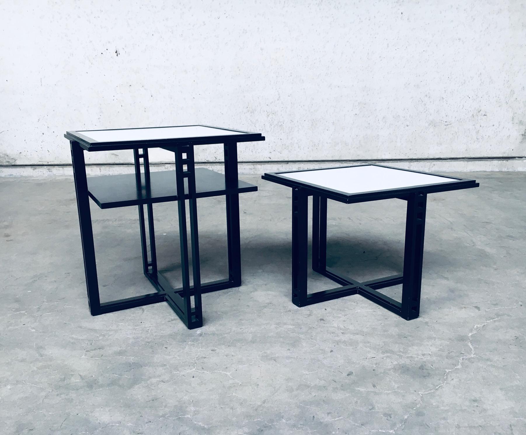 Postmodern Italian Design 'Galaxy' series square Side Table set of 2 by Umberto Asnago for Giorgetti, made in Italy 1980's. Black laquered wooden frame with white glass inlay on top. Higher two tier model and lower single model. Both are in very