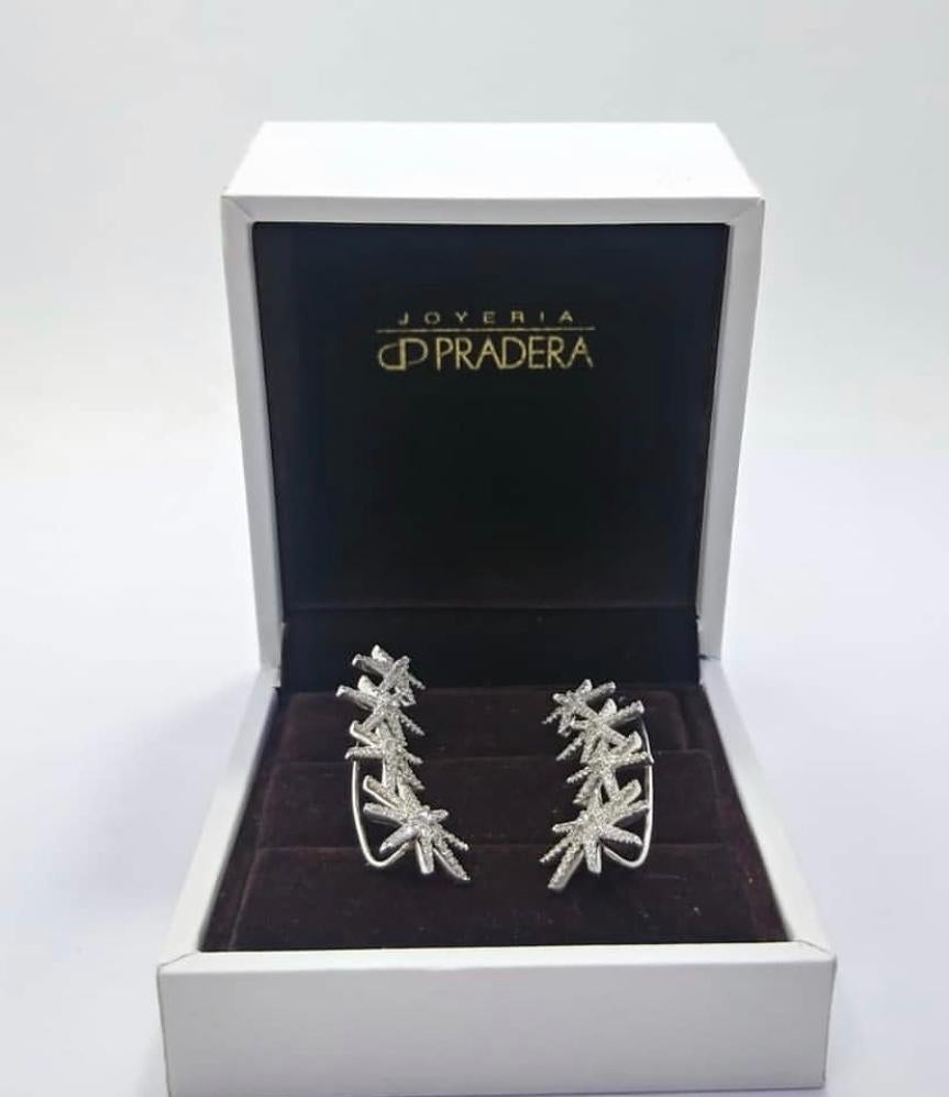 Irama Pradera is a Young designer from Spain that searches always for the best gems and combines classic with contemporary mounting and styles. 
The earrings measure 35mm in length and have a gross weight of 4gr.
Diamonds 252 pieces totaling 1.02ct 
