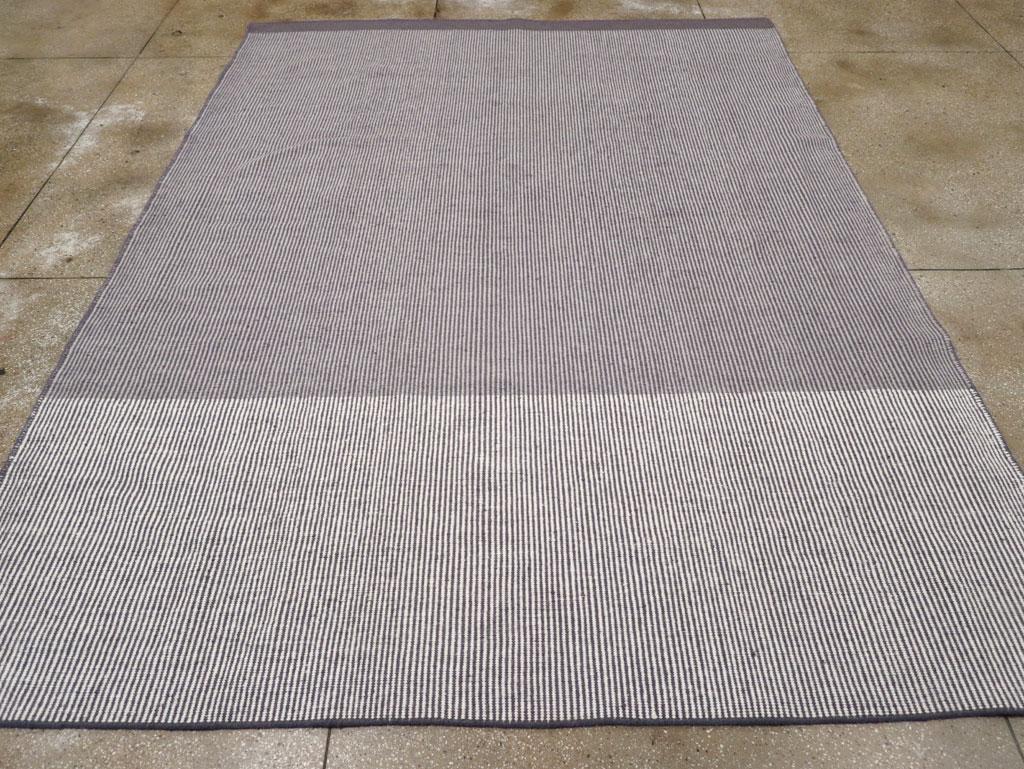 A modern Turkish flatweave room size carpet handmade during the 21st century.

Measures: 9' 1