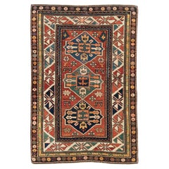 Collection Shabab Collection du début du 20e siècle Caucasien Kazak Tapis de brouhaha
