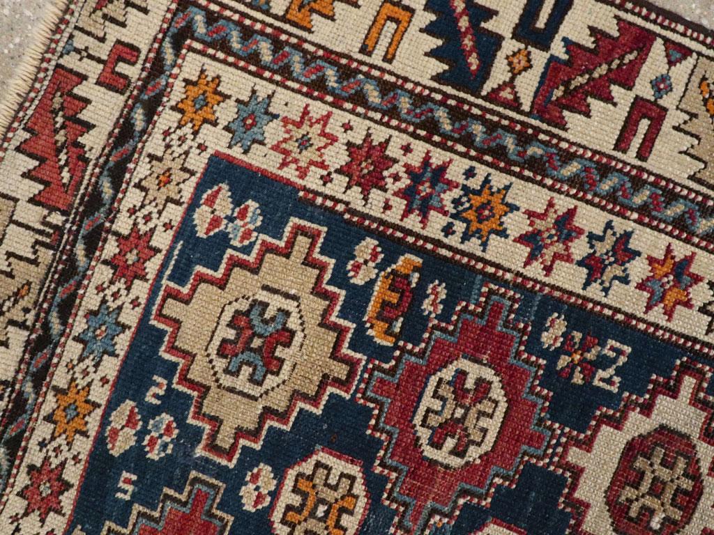 Hand-Knotted Galerie Shabab Collection Early 20th Century Caucasian Shirvan Throw Rug For Sale