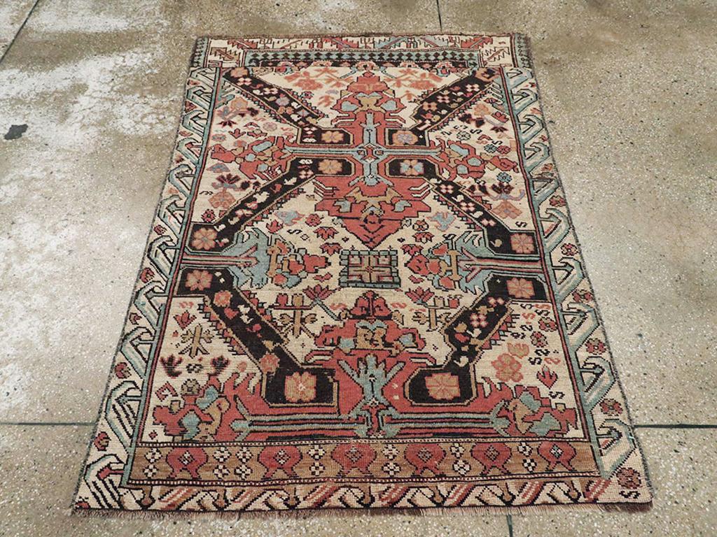 This Early 20th century Caucasian Zeykhur rug, measuring 3'6