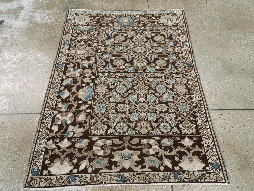An antique Persian Malayer sampler rug handmade during the Early 20th century.

Measures: 3' 5