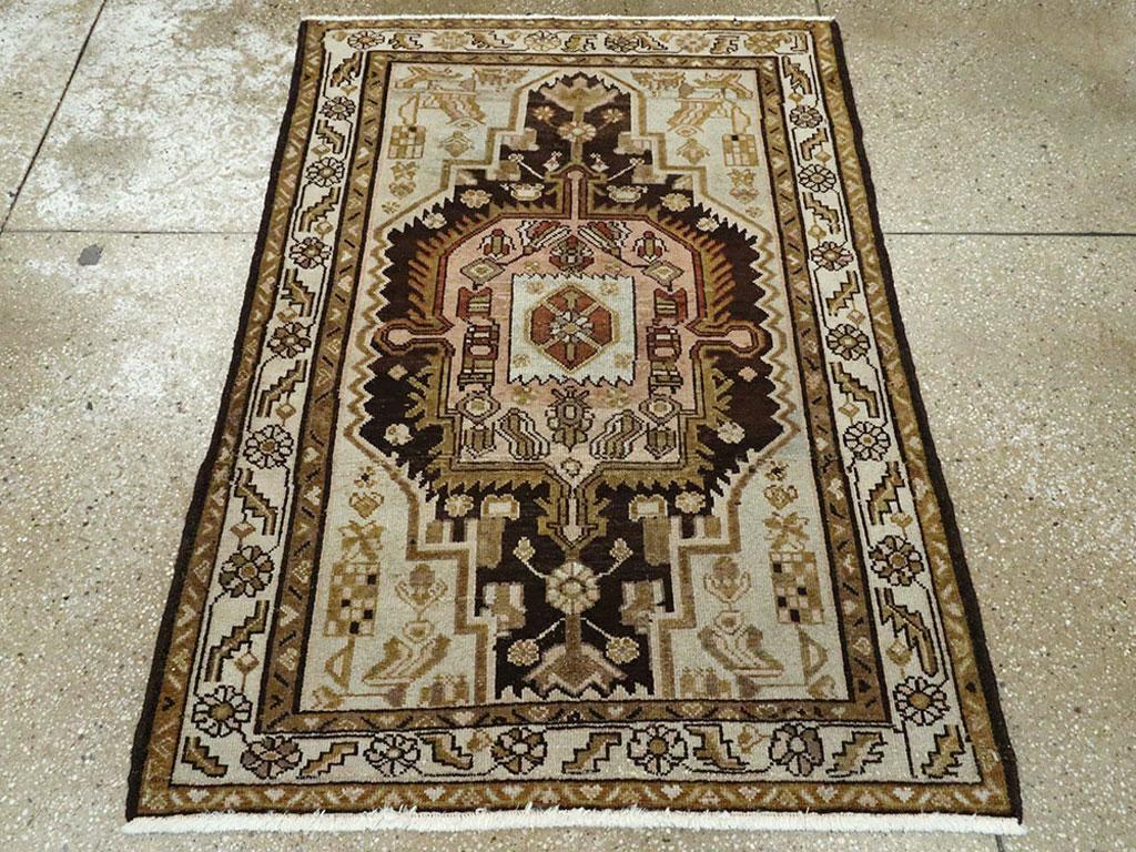 This Early 20th century Persian Malayer rug, measuring 3' 5