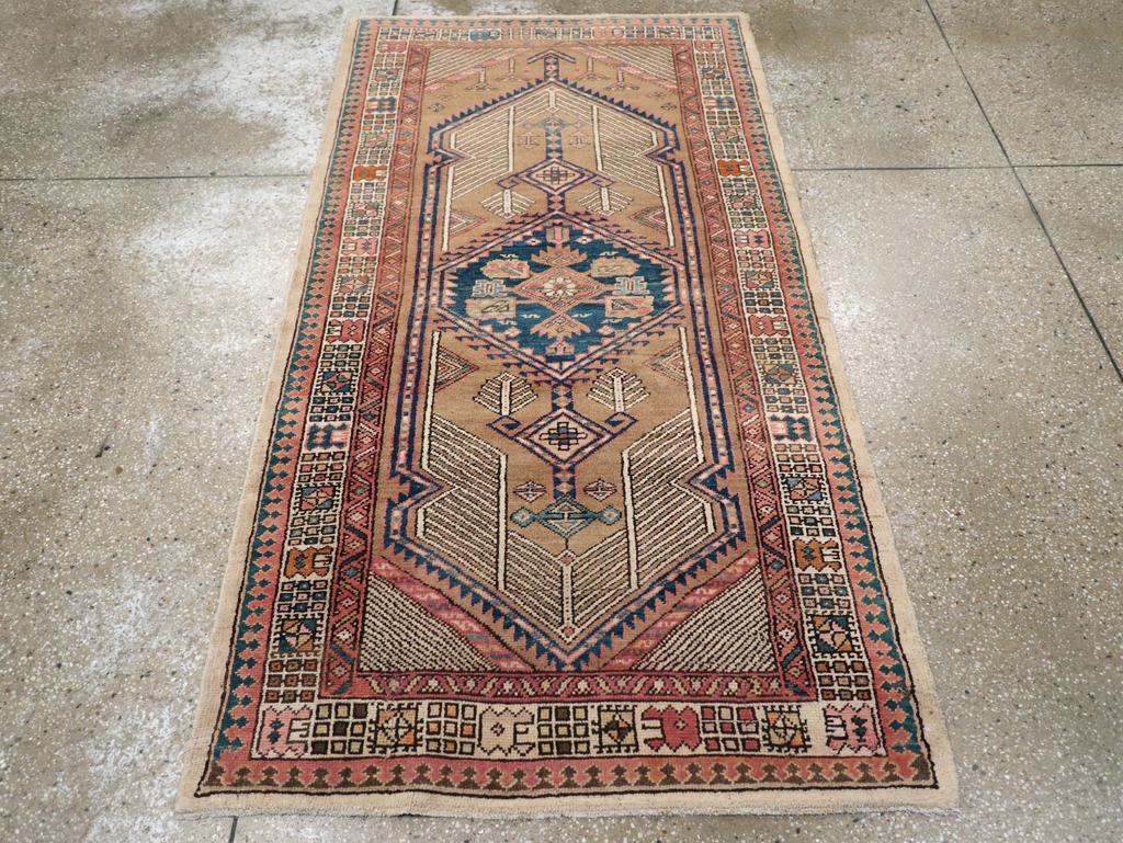 This Early 20th century Persian Malayer rug, measuring 3' 5