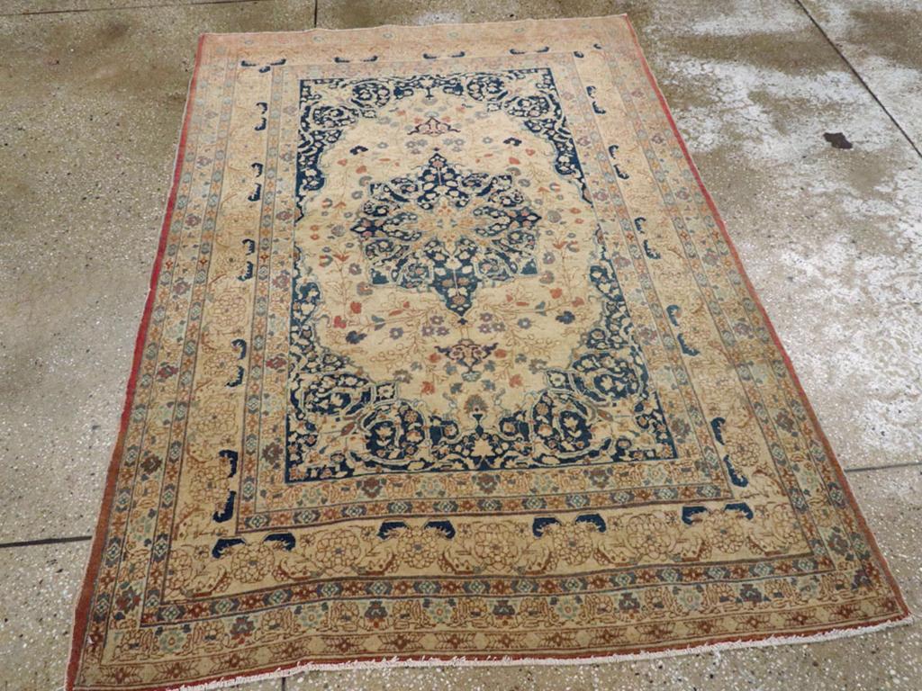 This Early 20th century Persian Tabriz Haji Jalili rug, measuring 4' 0