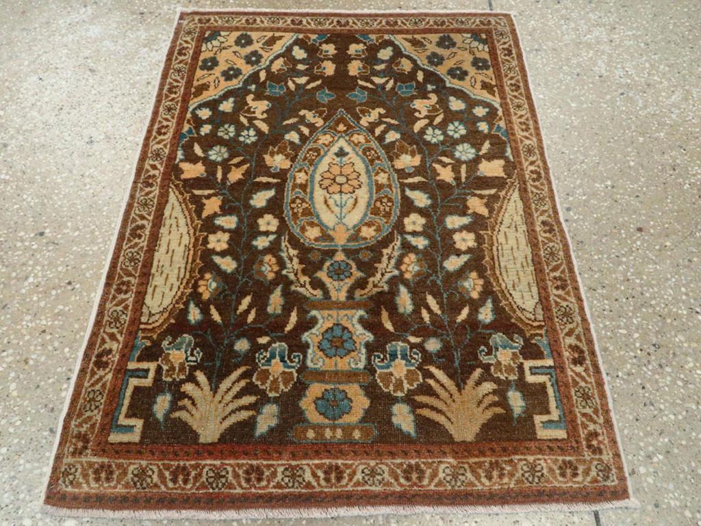 This early 20th-century Persian Tabriz Haji Jalili rug, measuring 1' 10