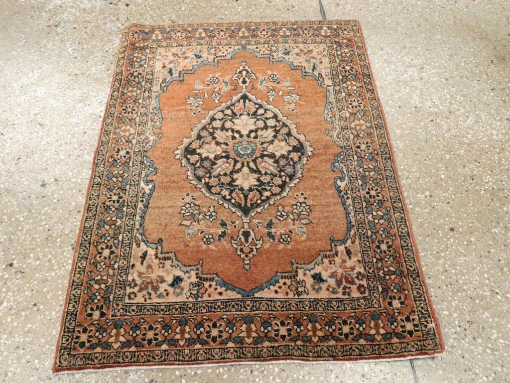 This early 20th-century Persian Tabriz Haji Jalili rug, measuring 1' 10