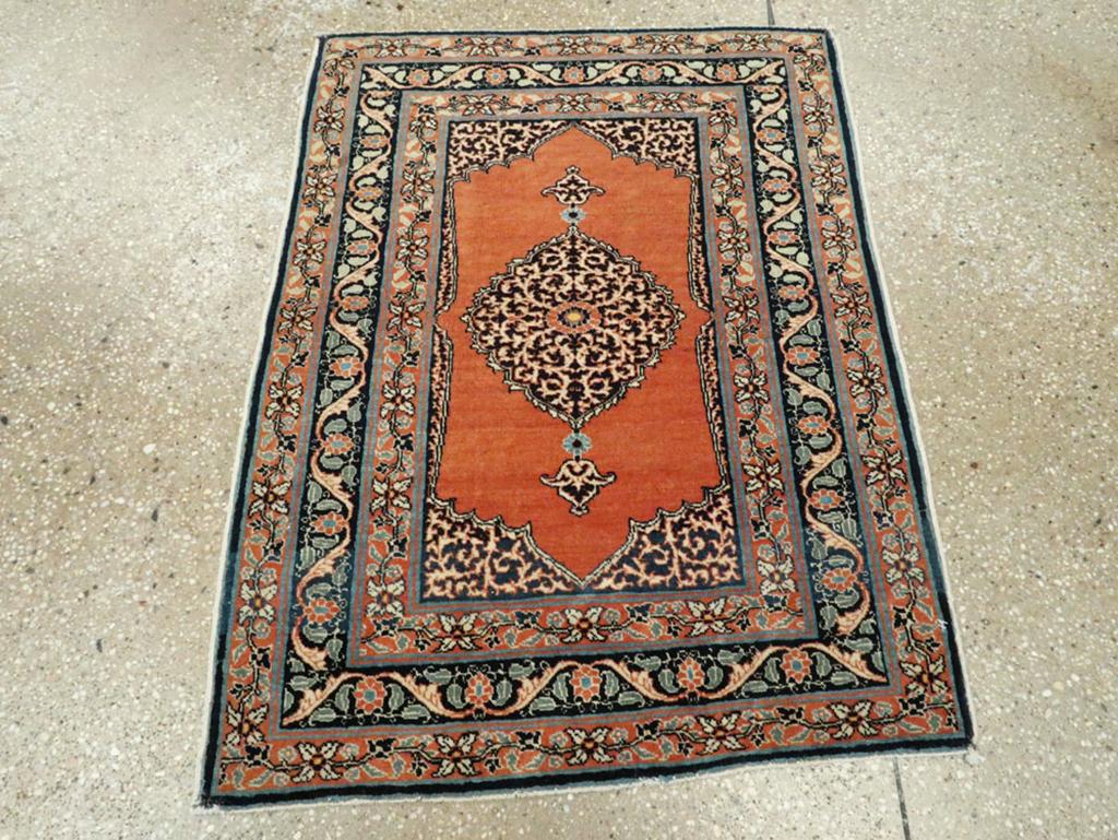 This early 20th-century Persian Tabriz Haji Jalili rug, measuring 2'3