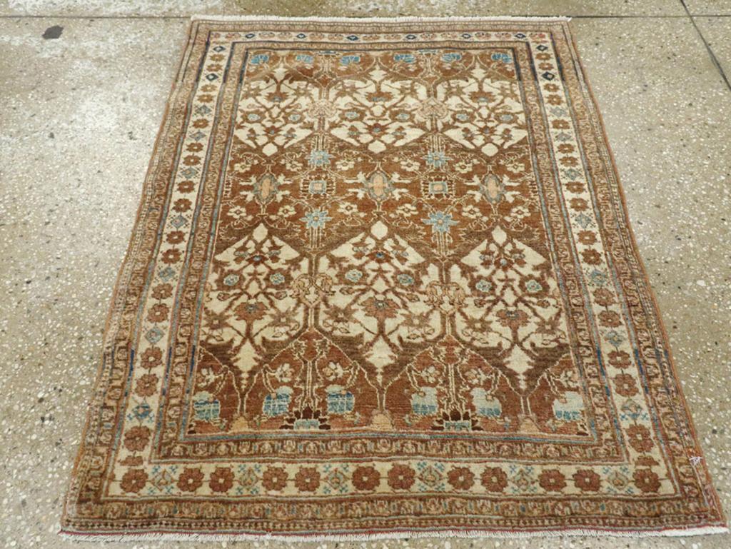 This early 20th-century Persian Tabriz Haji Jalili rug, measuring 2'5