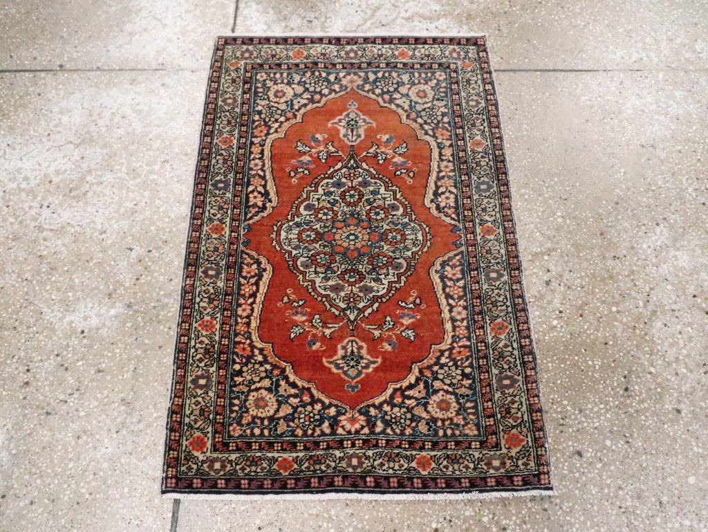 This early 20th-century Persian Tabriz Haji Jalili rug, measuring 1'10