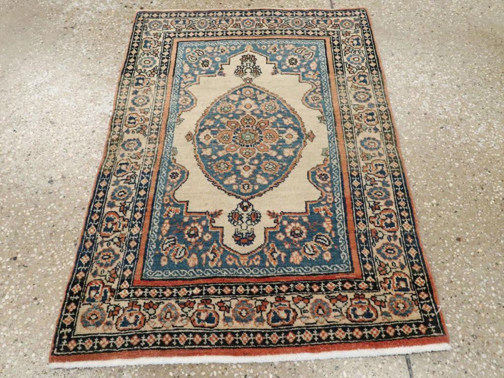 This early 20th-century Persian Tabriz Haji Jalili rug, measuring 1' 10