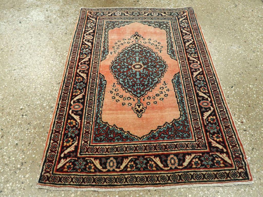 This early 20th-century Persian Tabriz Haji Jalili rug, measuring 1' 10